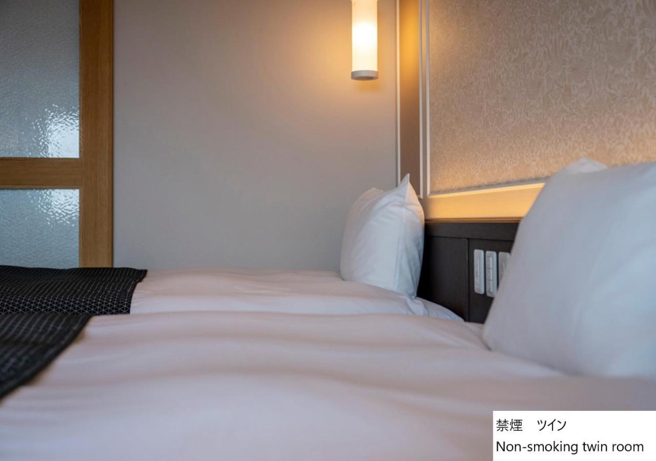 Twin Room - Photo 7