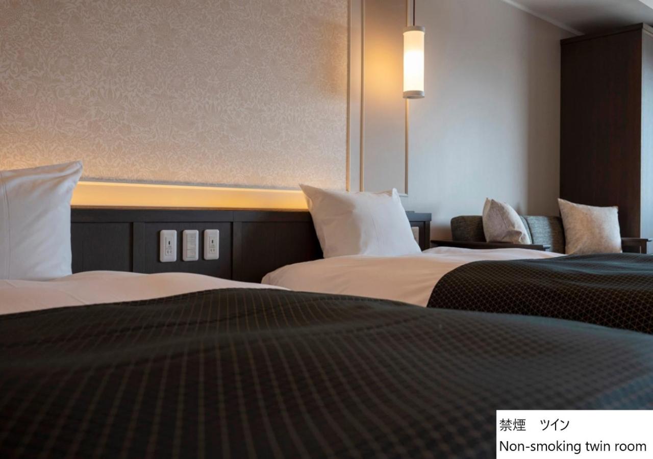 Twin Room - Photo 9