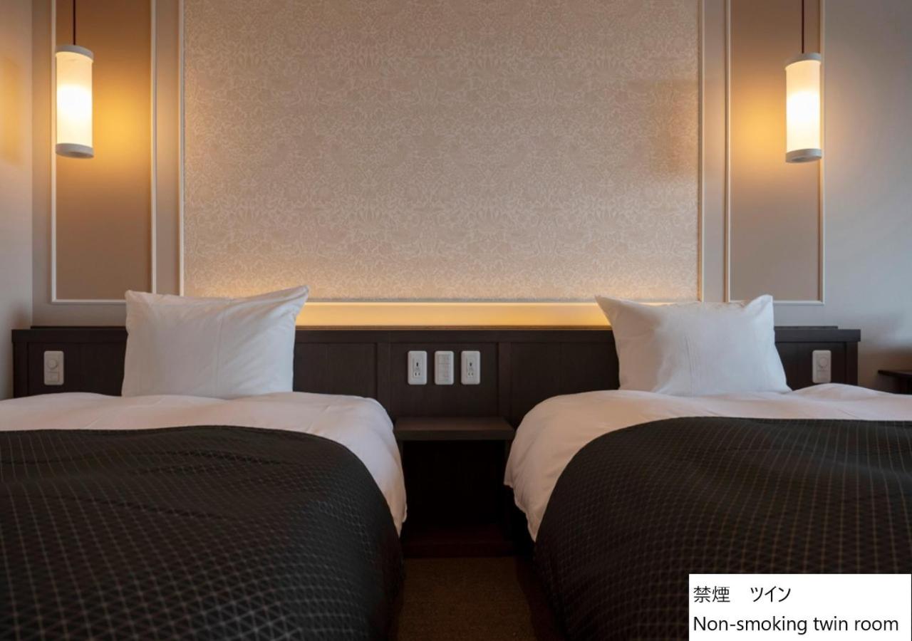 Twin Room - Photo 11