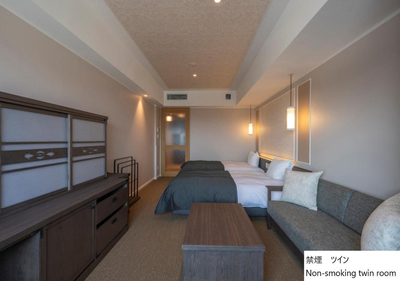 Twin Room - Photo 8