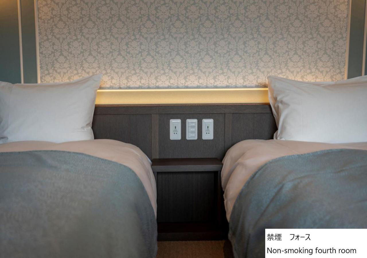 Quadruple Room - Photo 13