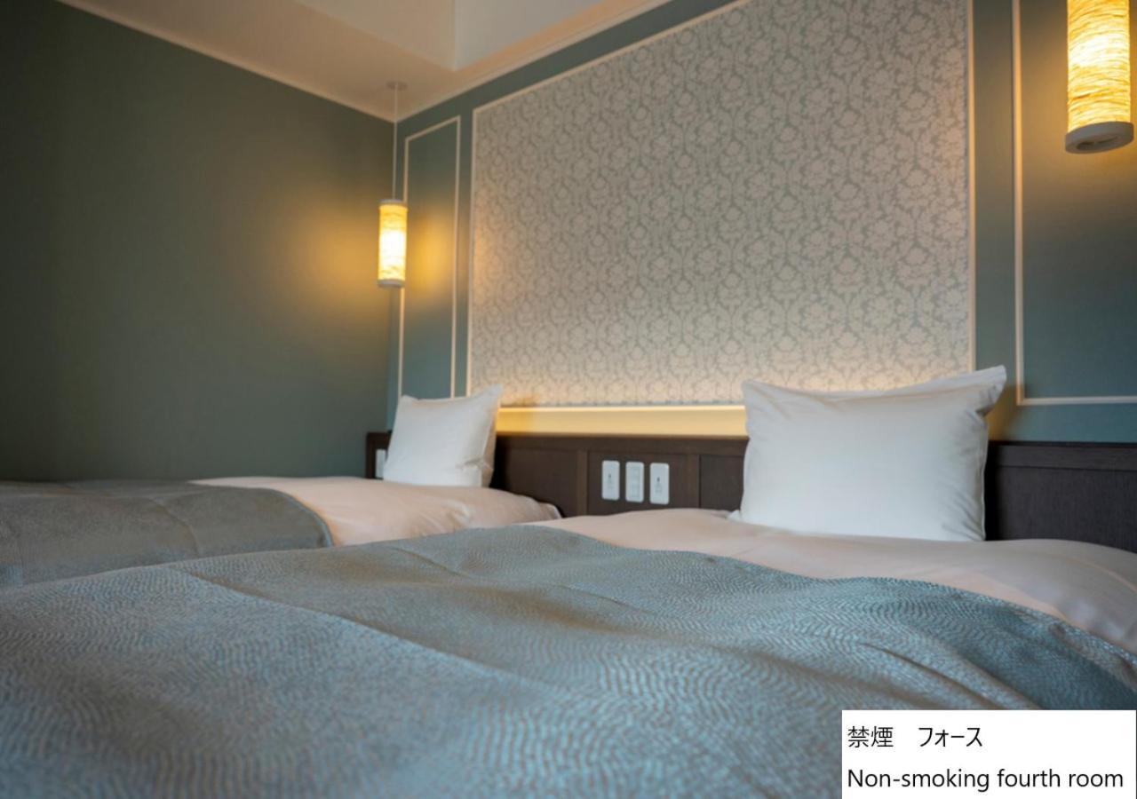 Quadruple Room - Photo 9