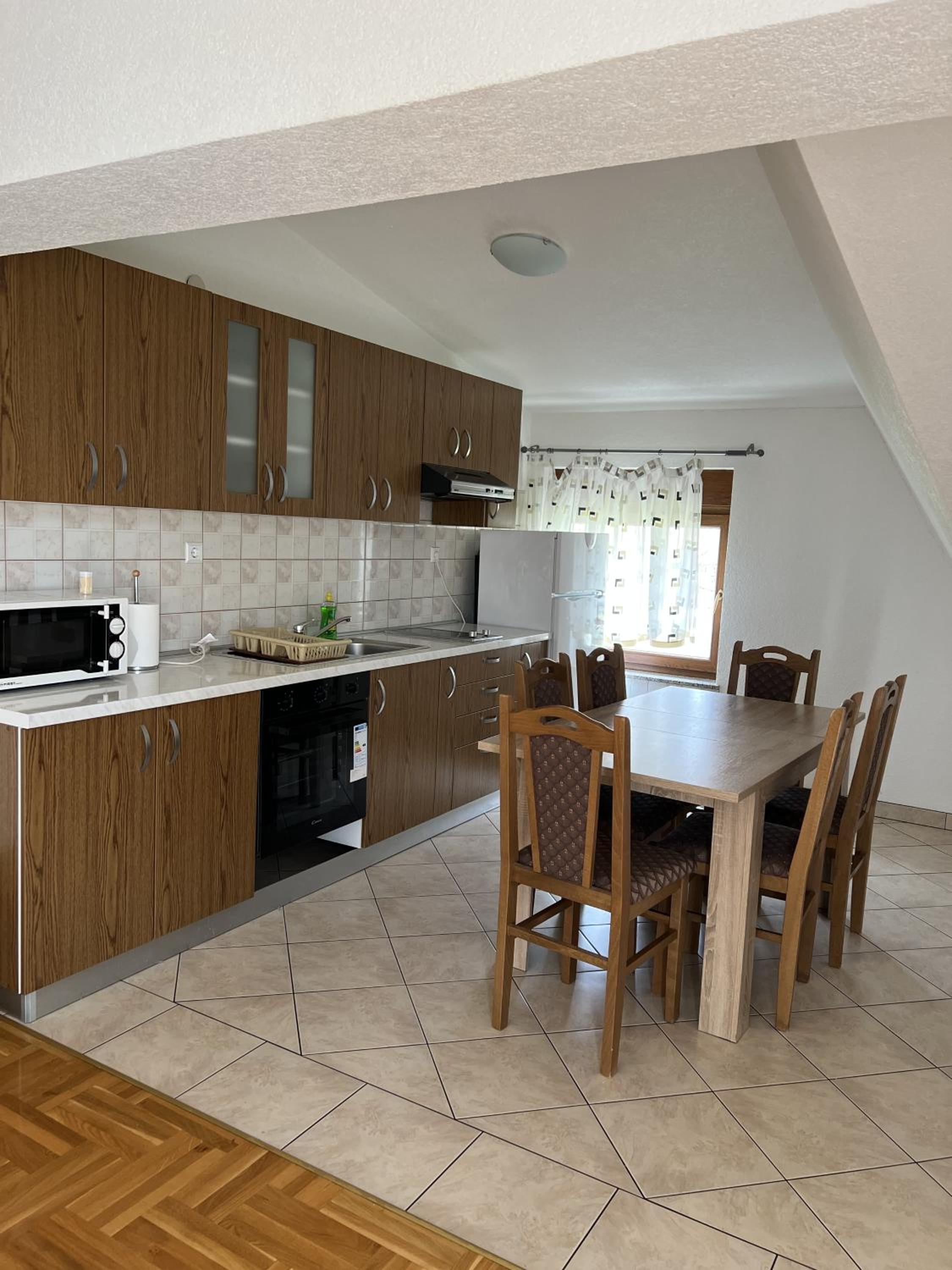 Three-Bedroom Apartment - Photo 10