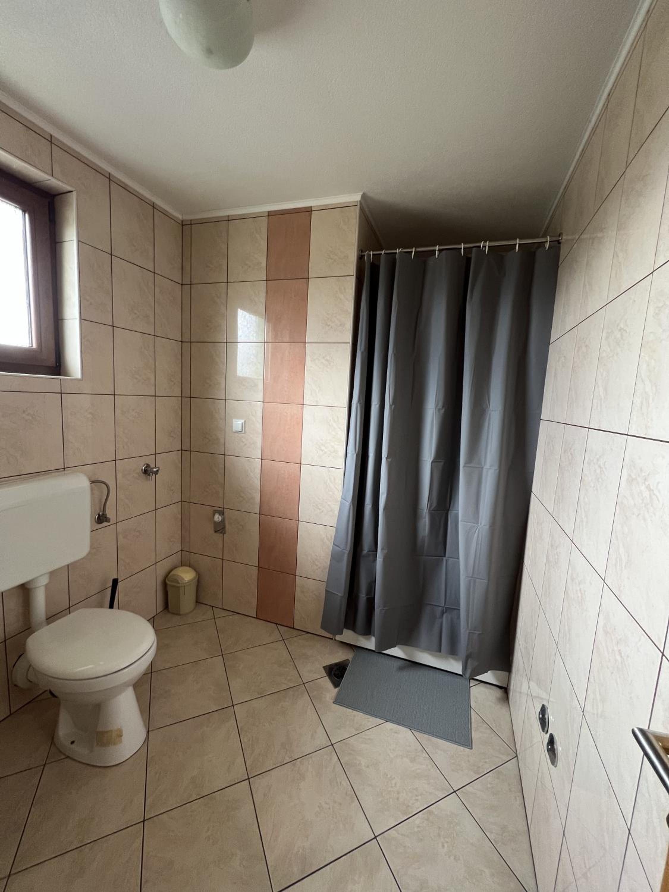 Three-Bedroom Apartment - Photo 15