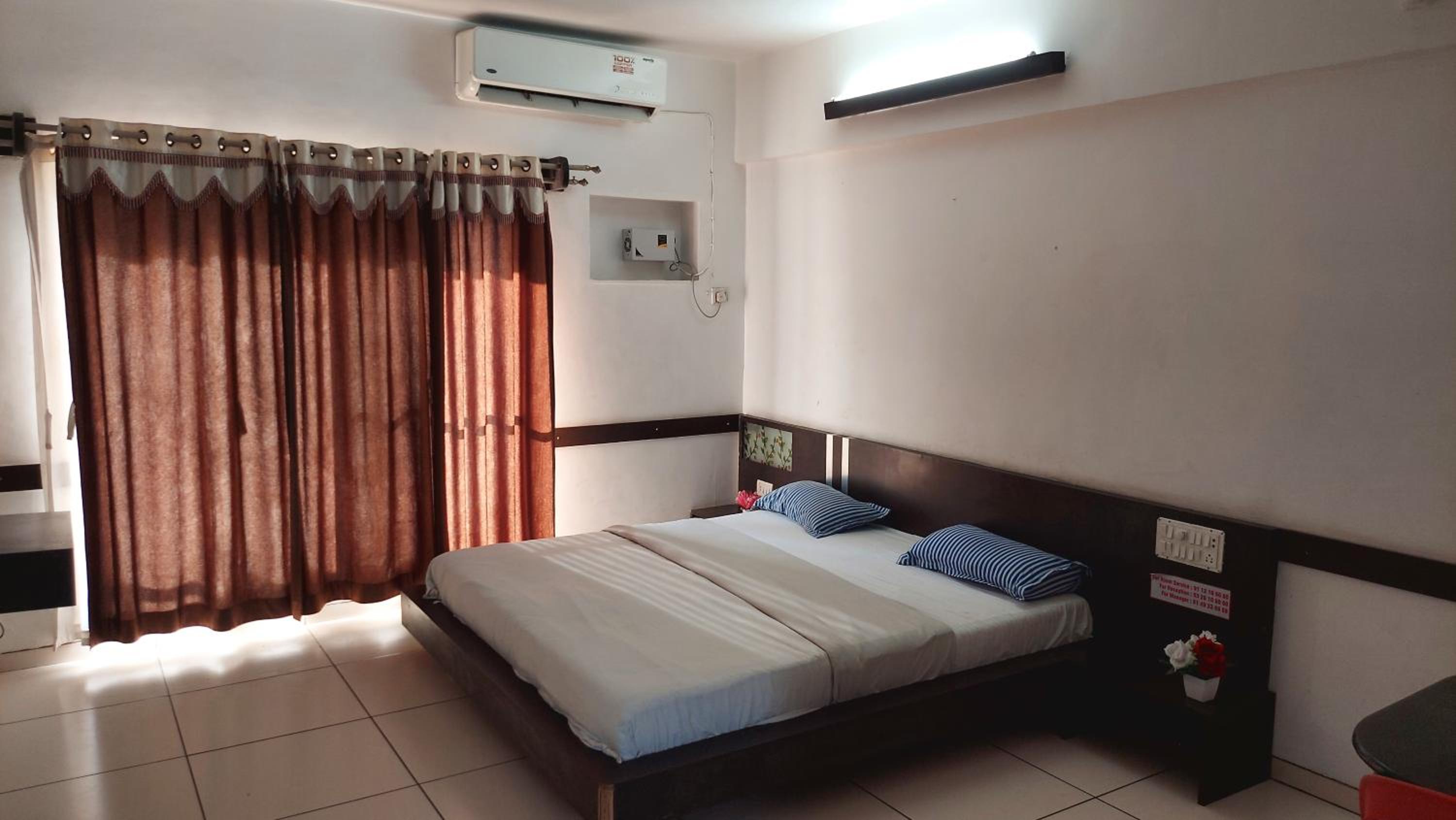 Deluxe Room - Photo 1