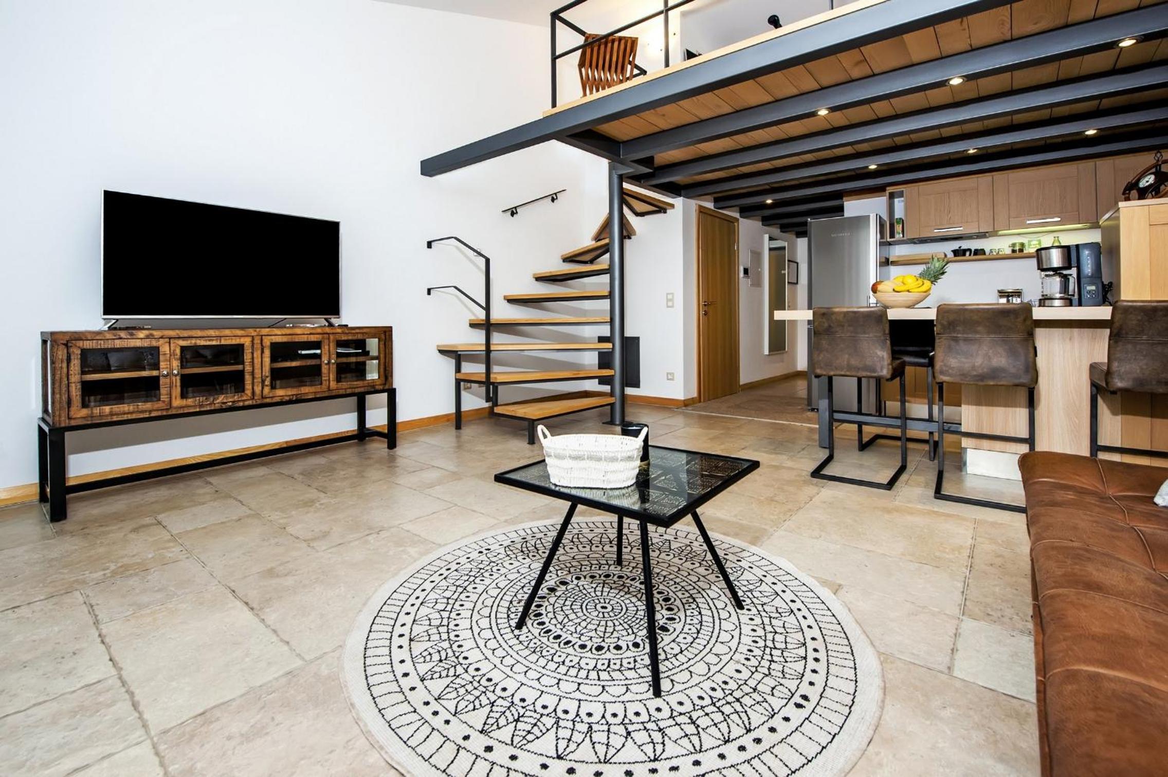 Duplex Apartment with terrace and lateral sea view