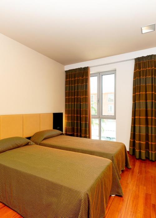 Twin Room - Photo 1