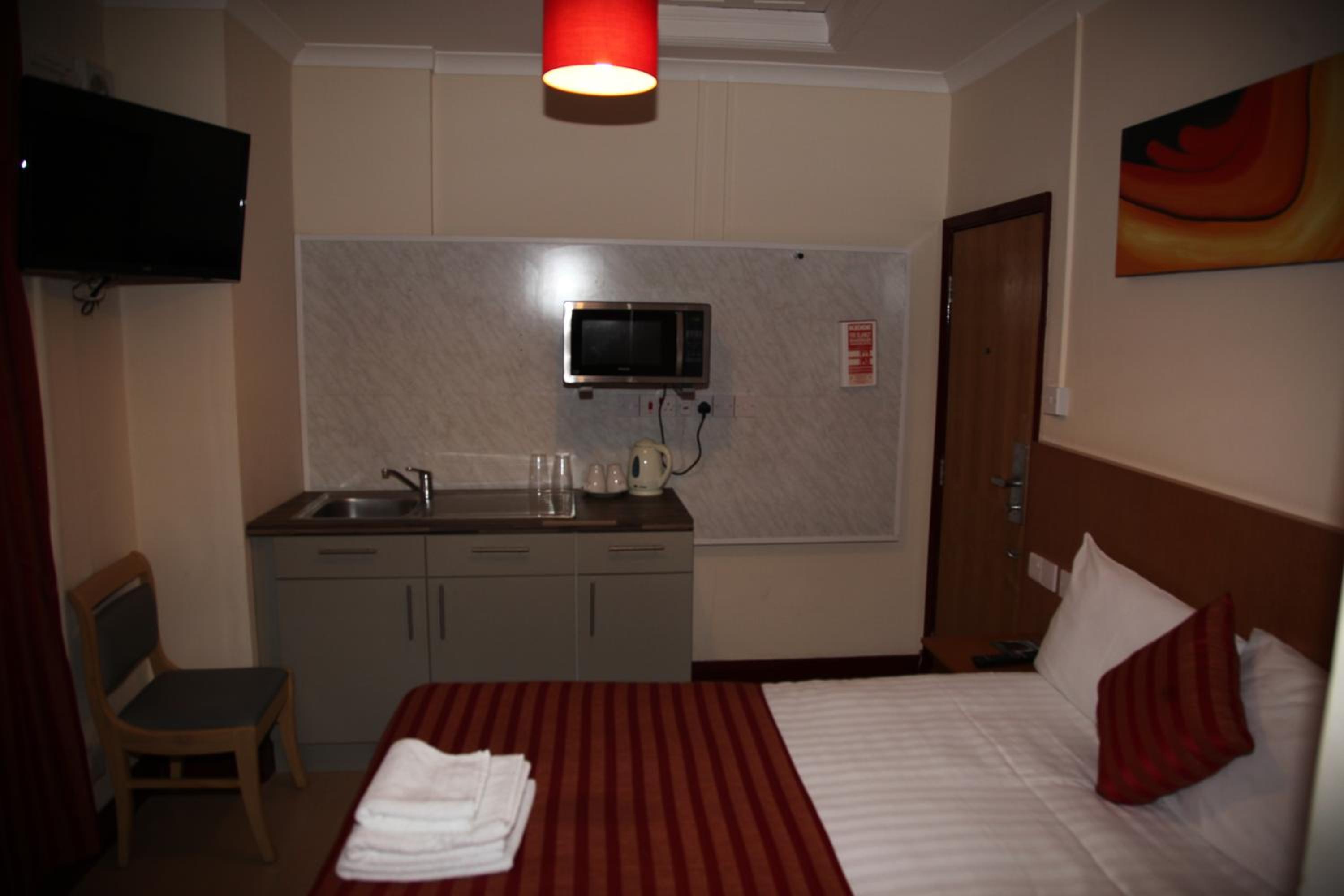 One-Bedroom Apartment (2 Adults + 1 Child) photo 1