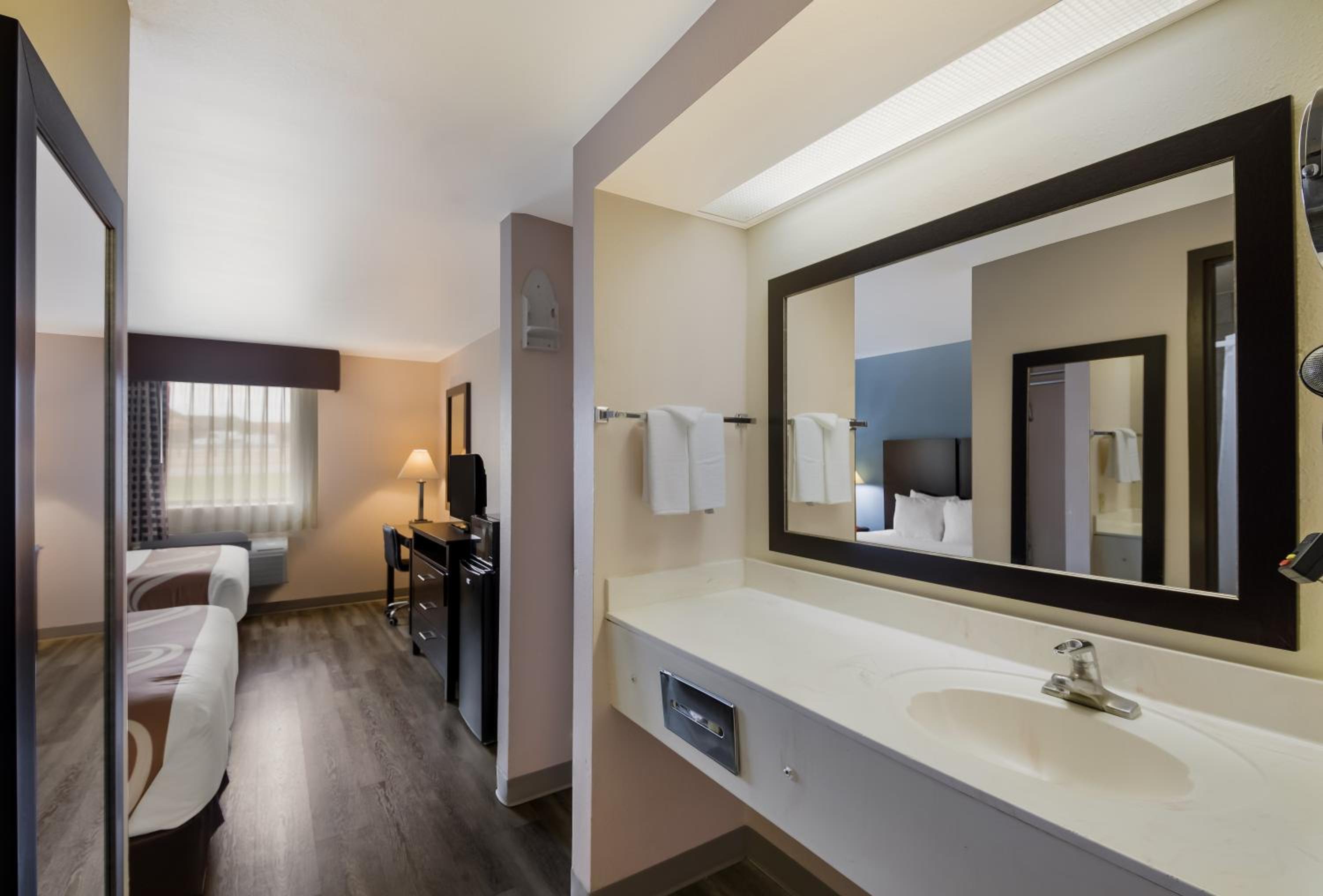 Queen Suite with Two Queen Beds and Sofa Bed - Photo 2