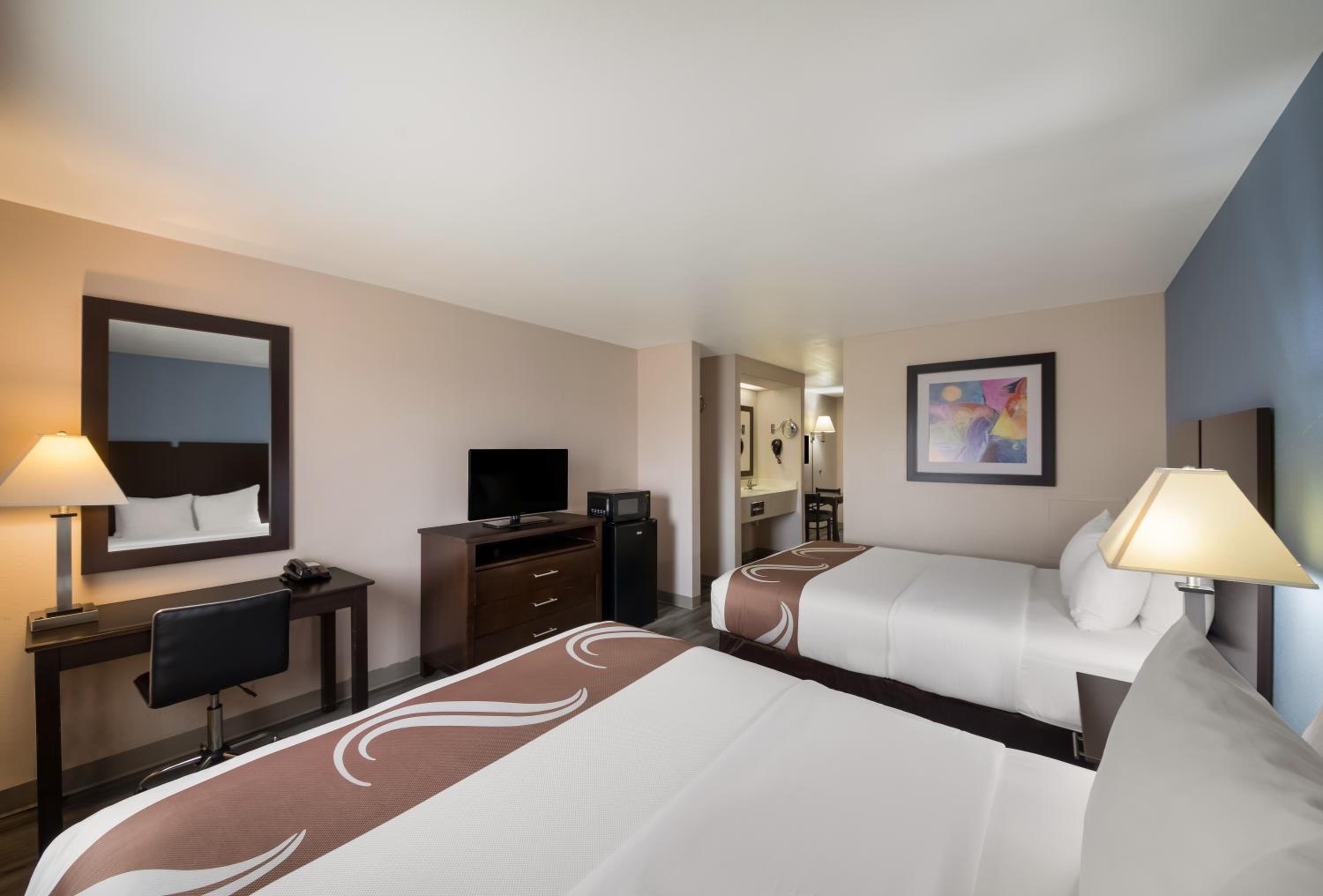 Queen Suite with Two Queen Beds and Sofa Bed - Photo 3