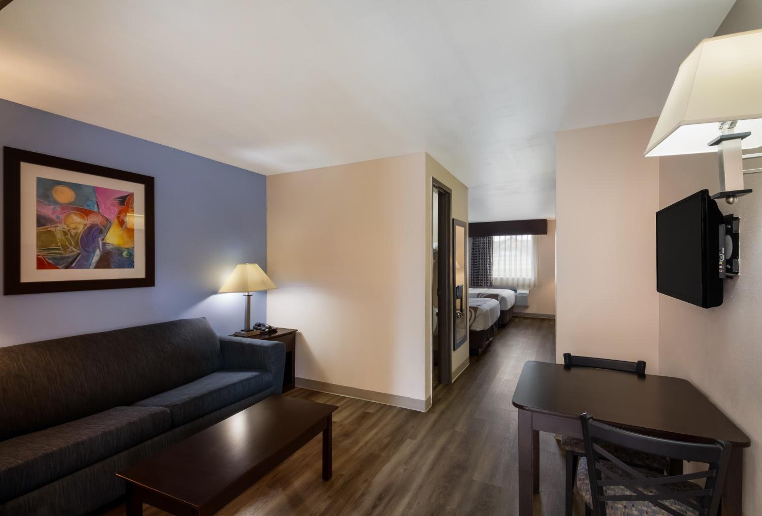 Queen Suite with Two Queen Beds and Sofa Bed - Photo 6