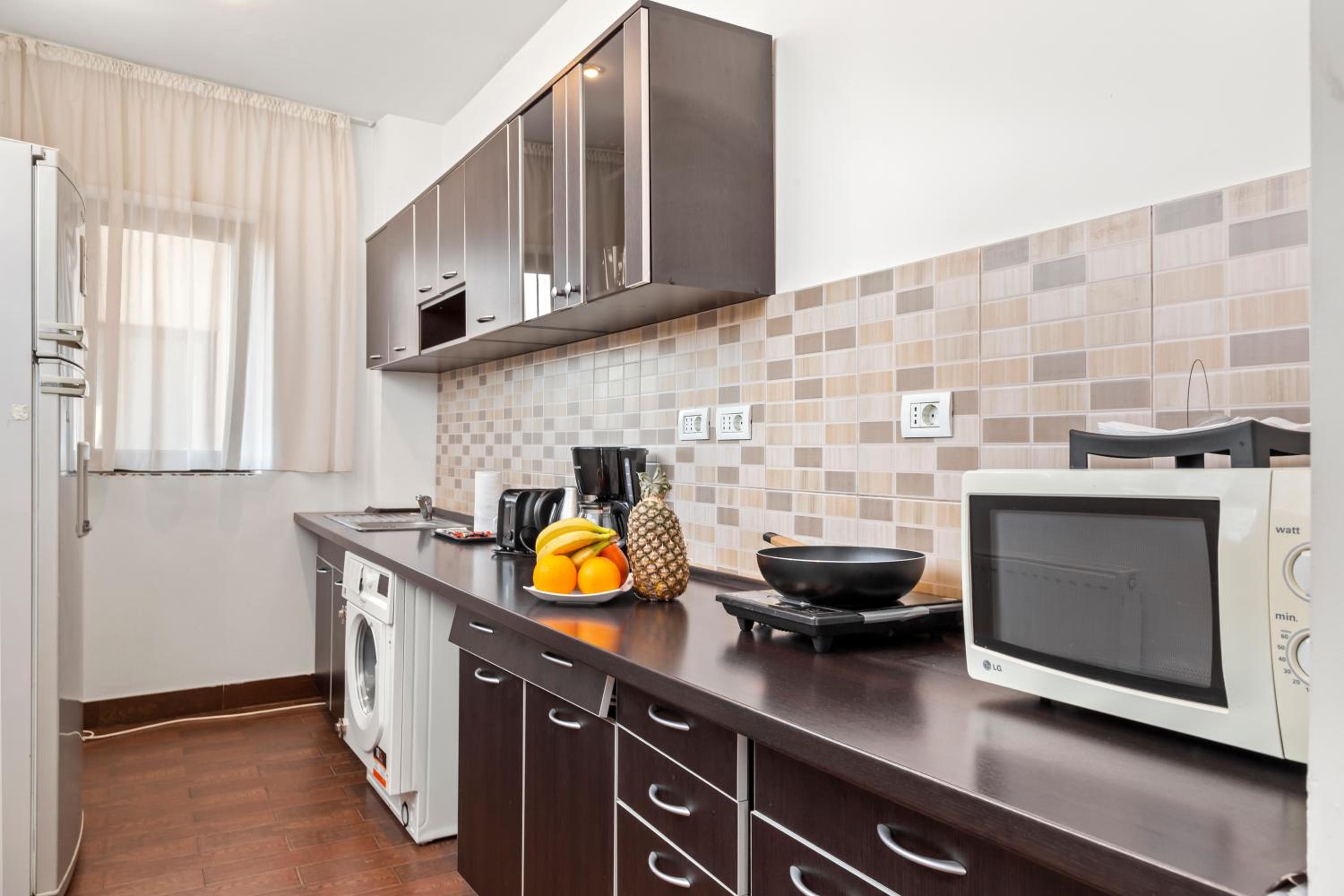 One-Bedroom Apartment with Balcony - Photo 3