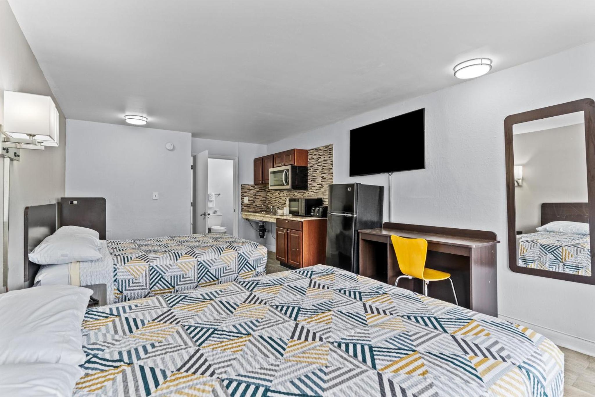 Queen Room with Two Queen Beds - Disability Access - Roll In Shower - Photo 1