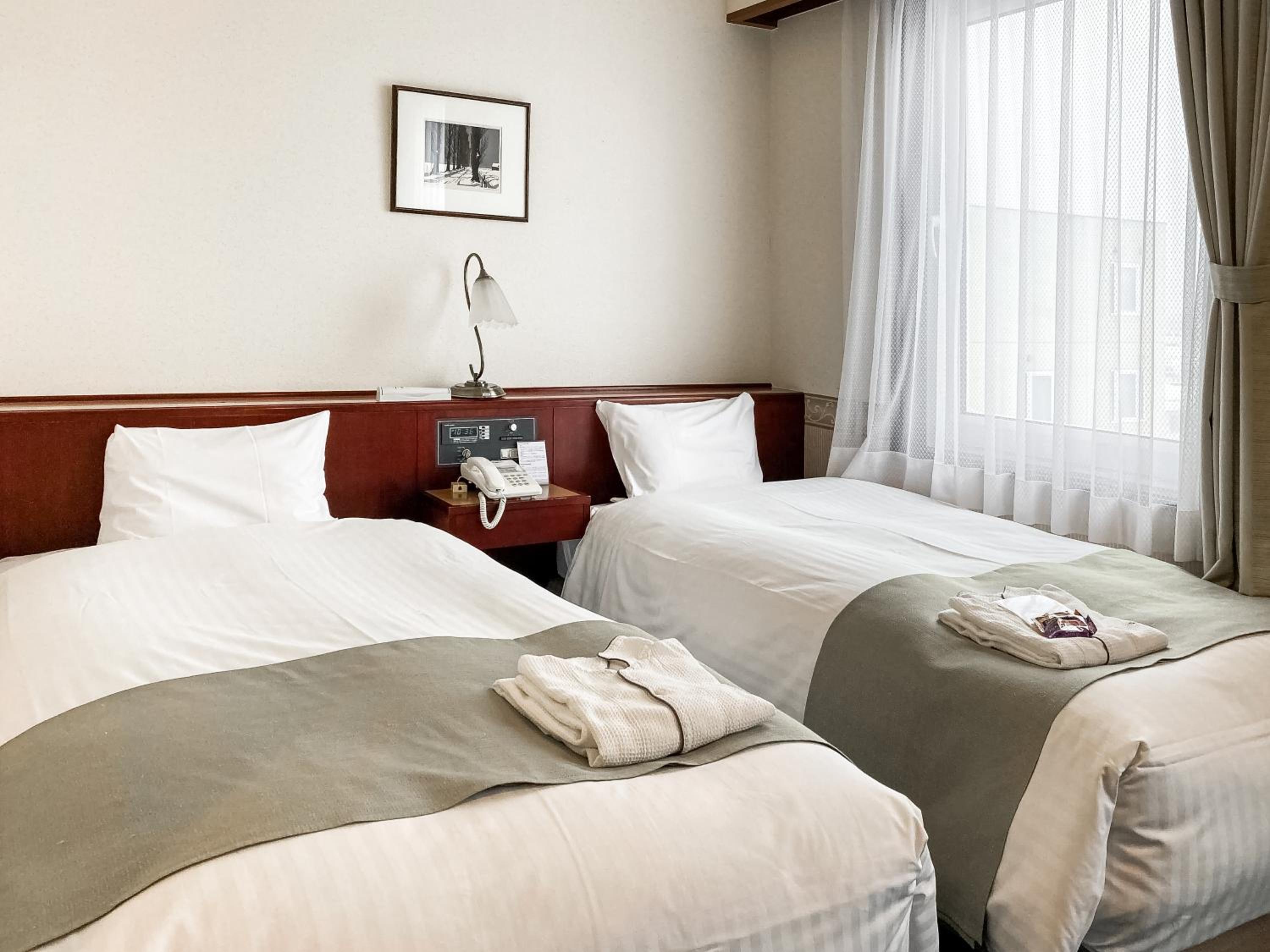 Economy Twin Room - Photo 1