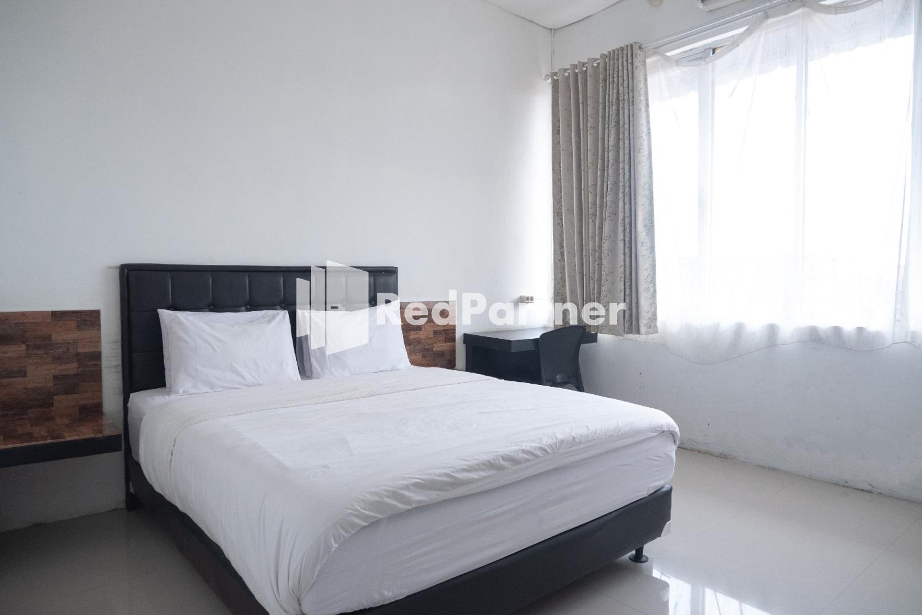 Deluxe Room - Photo 1