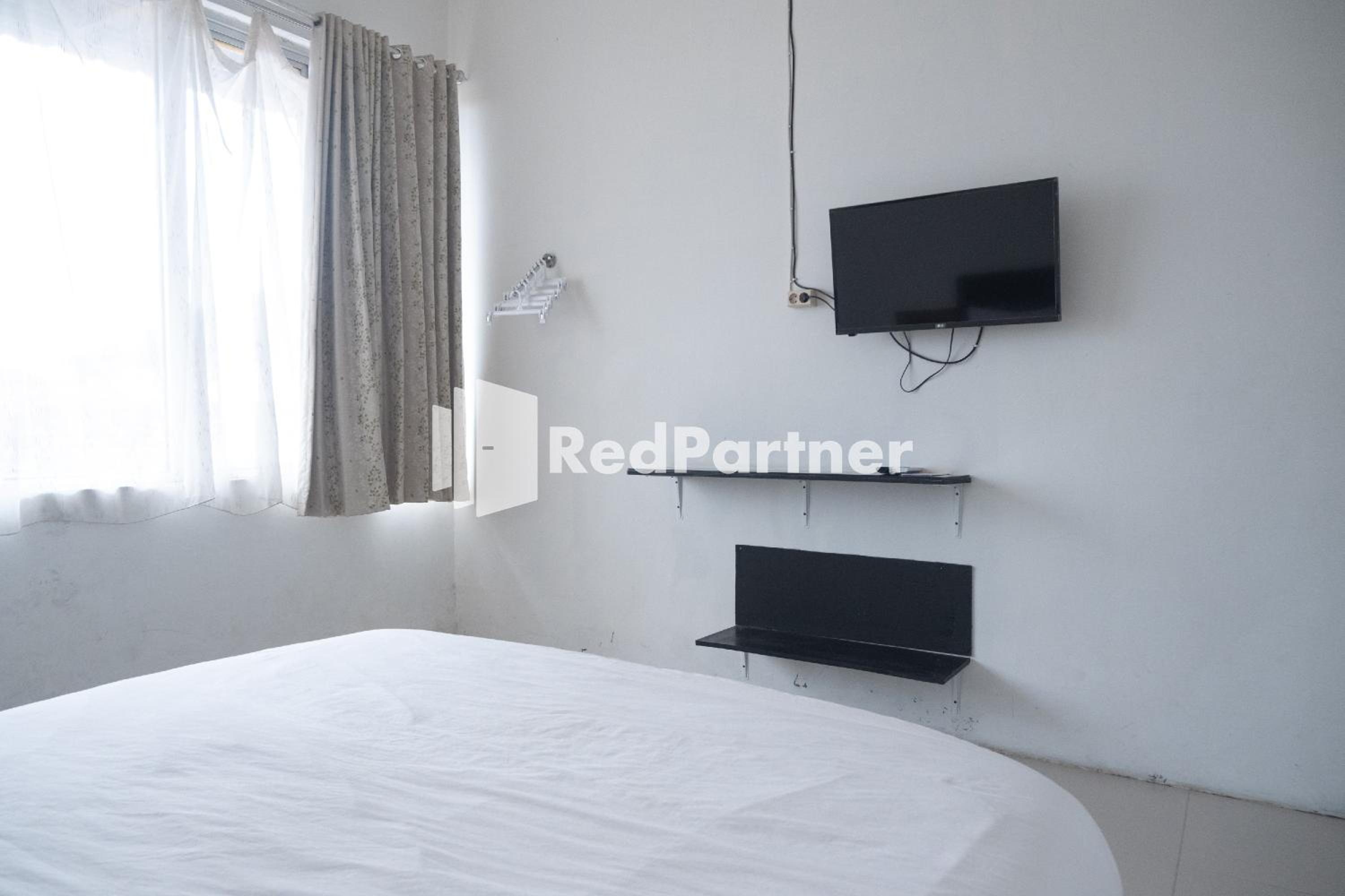 Deluxe Room - Photo 9