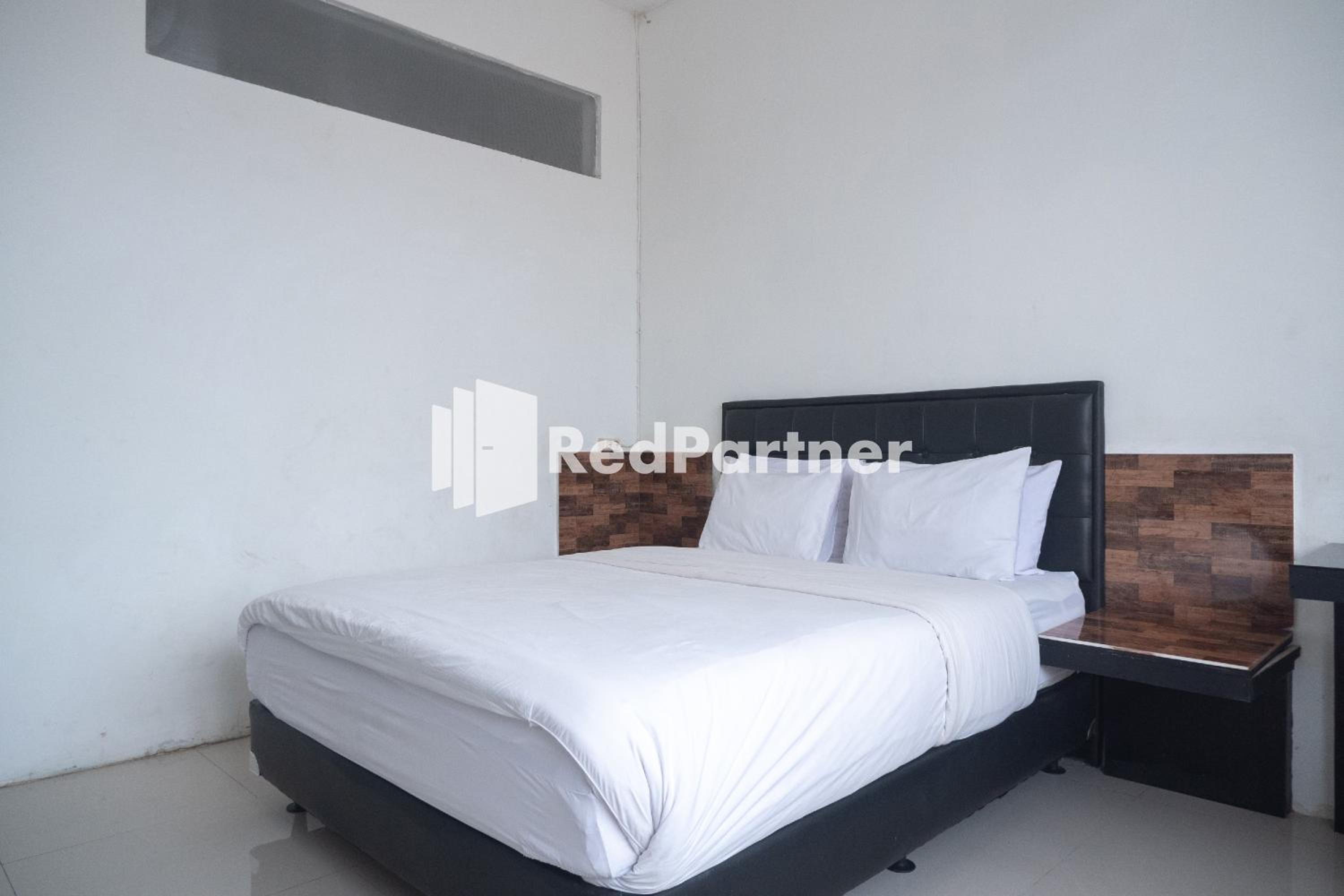 Deluxe Room - Photo 8