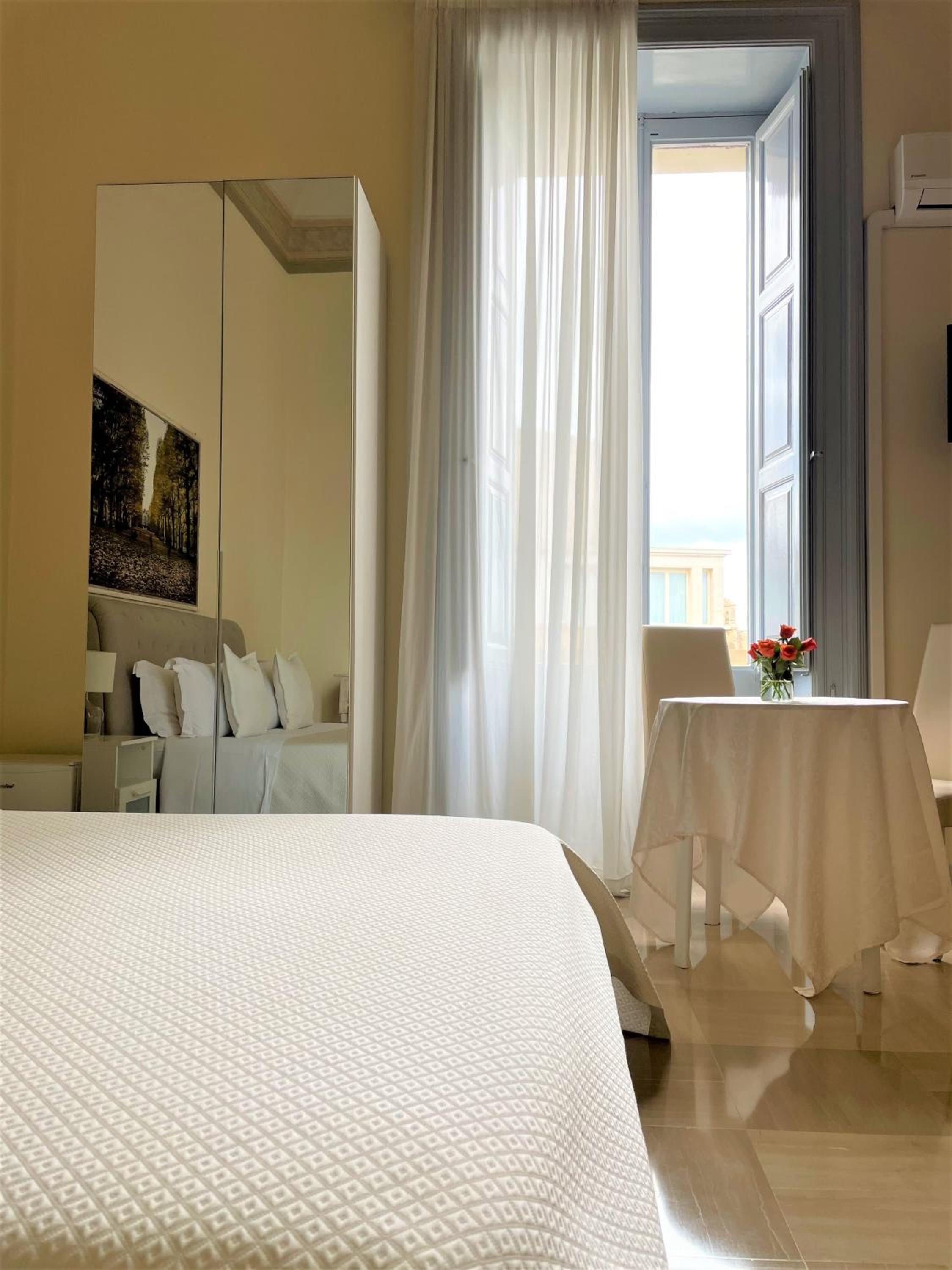 Quadruple Room with Balcony photo 2