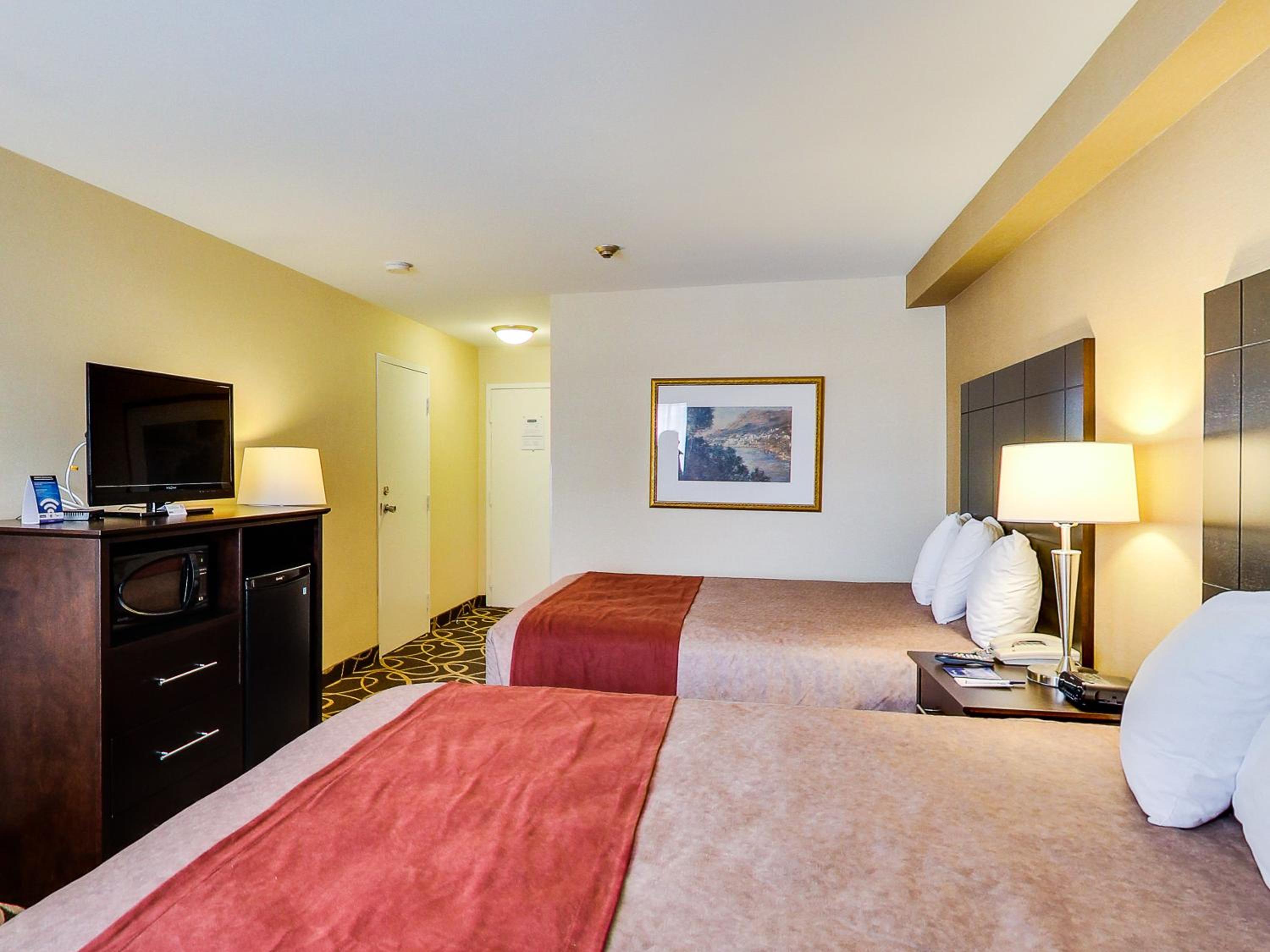 Queen Room with Two Queen Beds - Non-Smoking - Photo 4