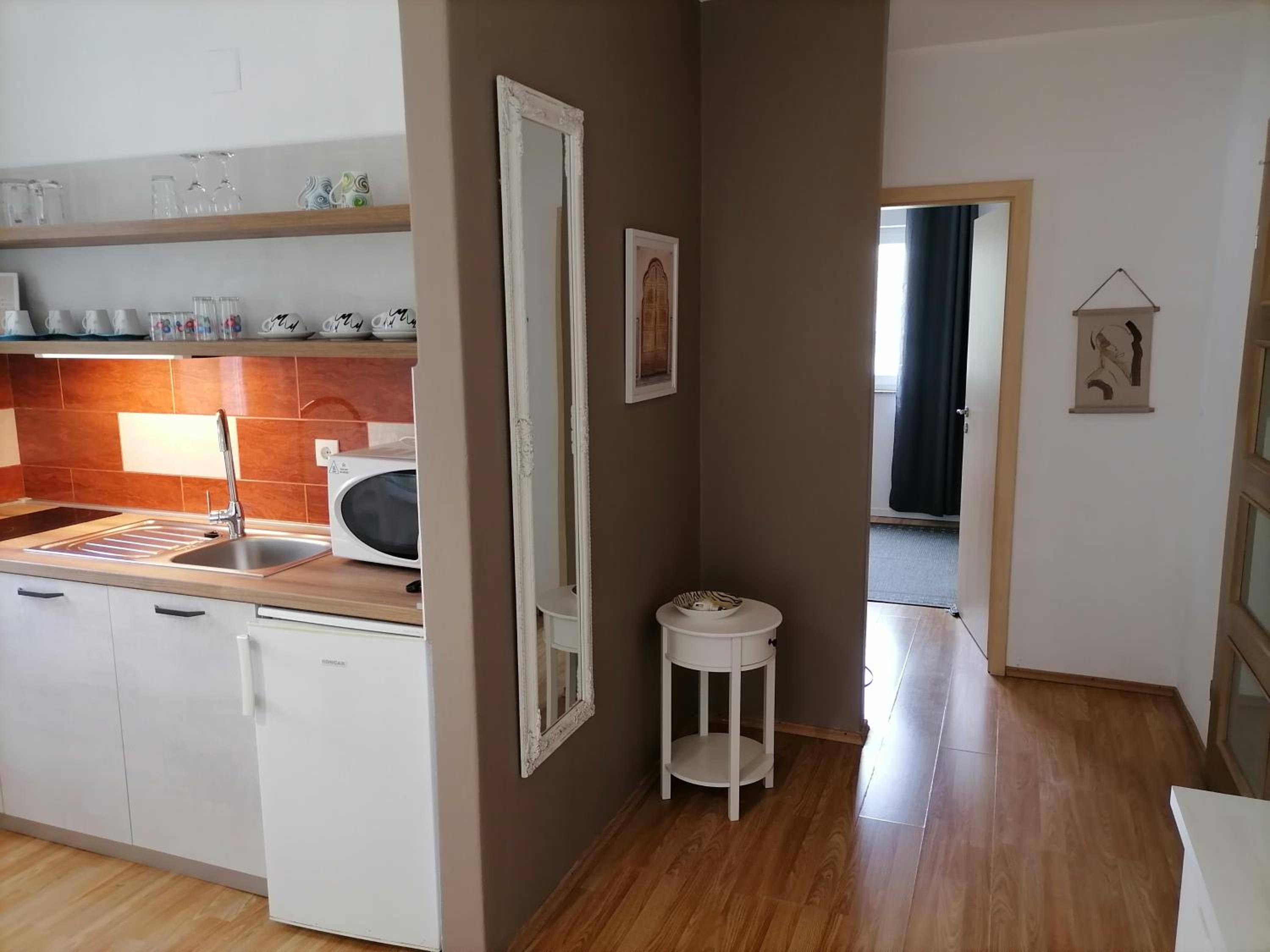 Apartment with Balcony - Photo 5
