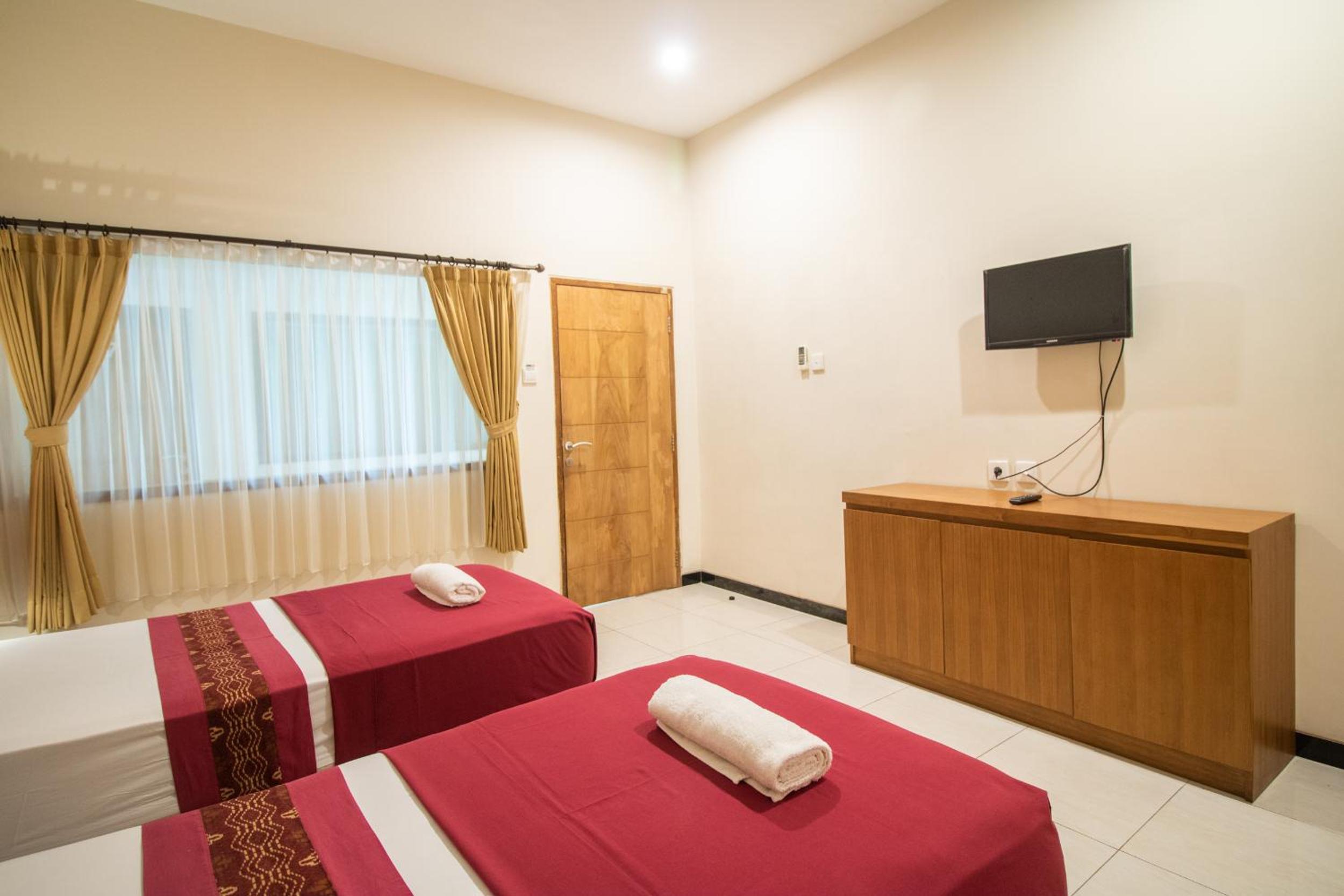 Standard Twin Room - Photo 8