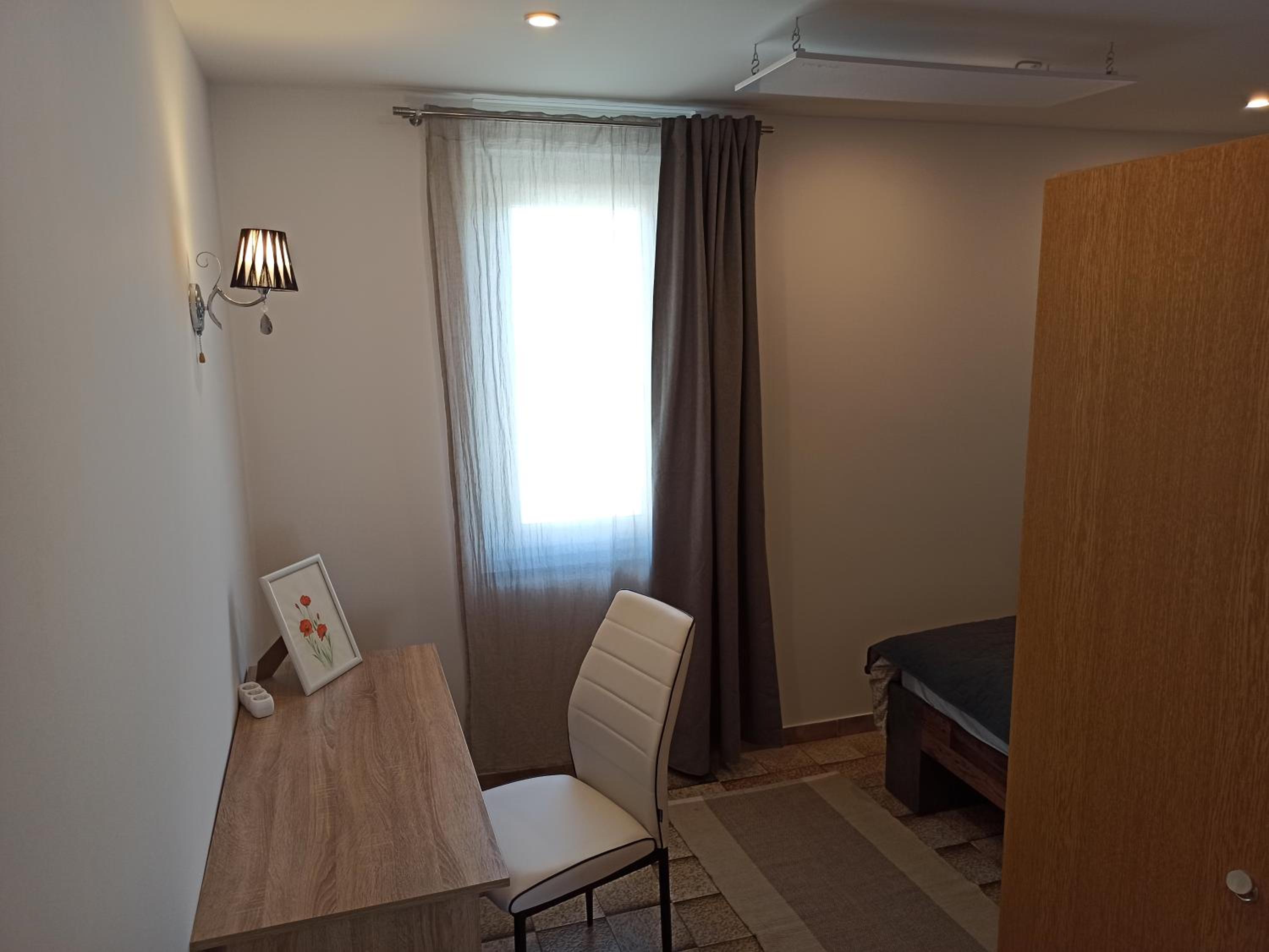 Three-Bedroom Apartment photo 1