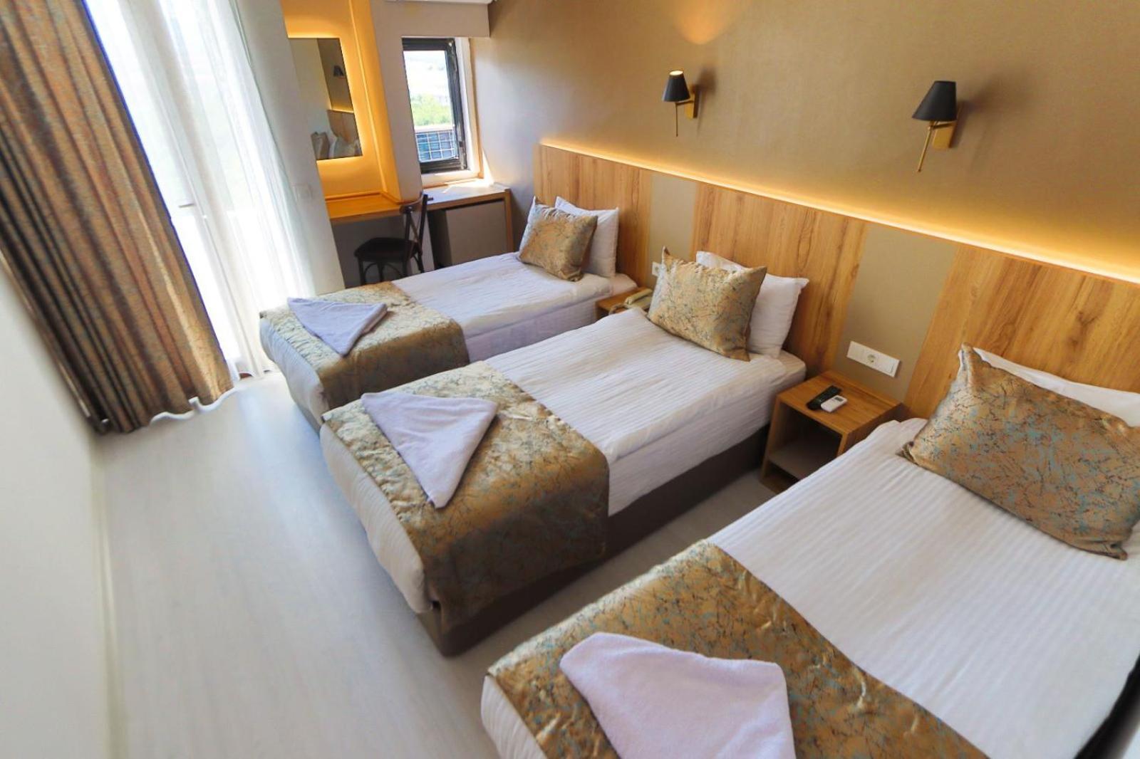 Triple Room - Photo 1