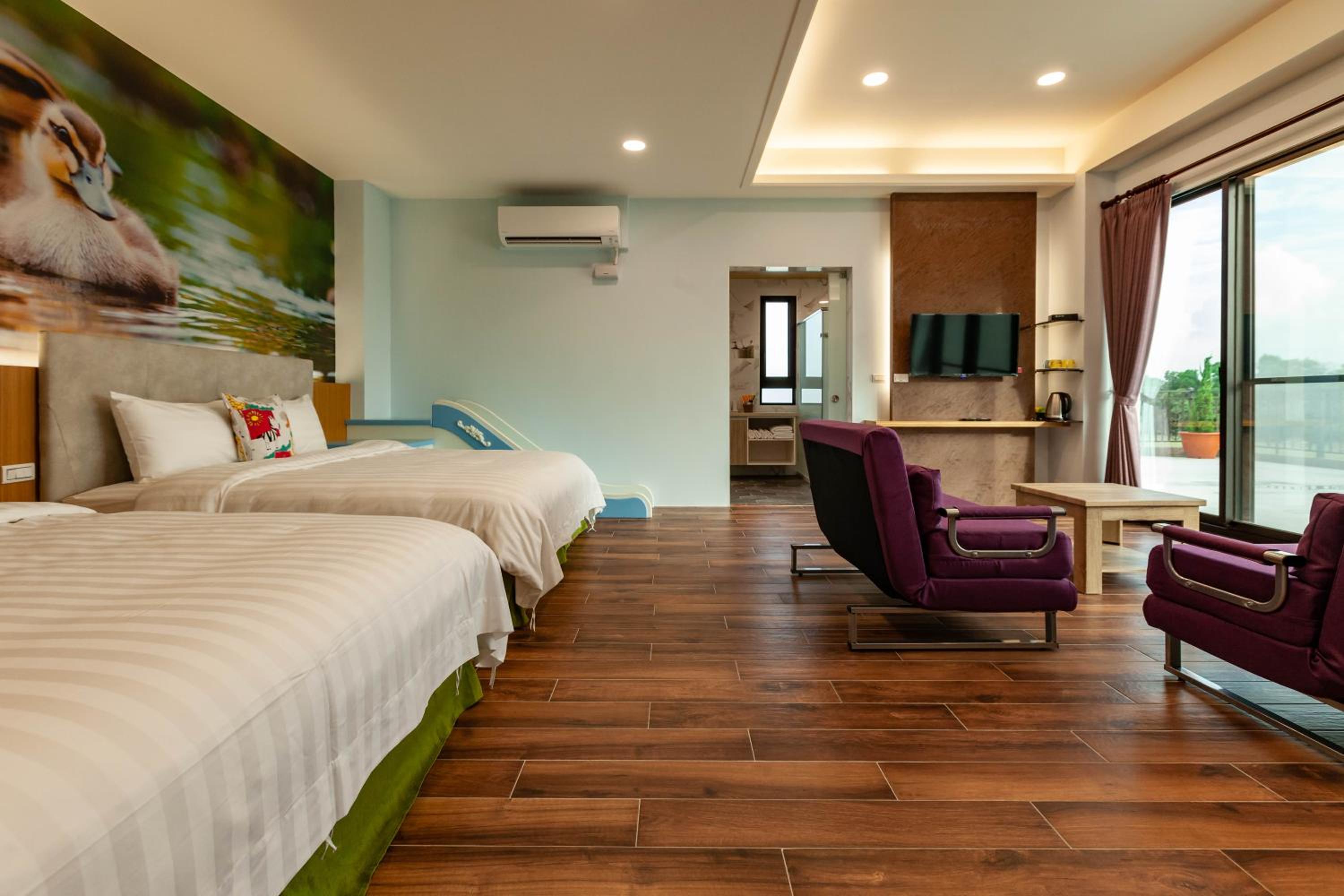 Family Room with Balcony - Photo 1