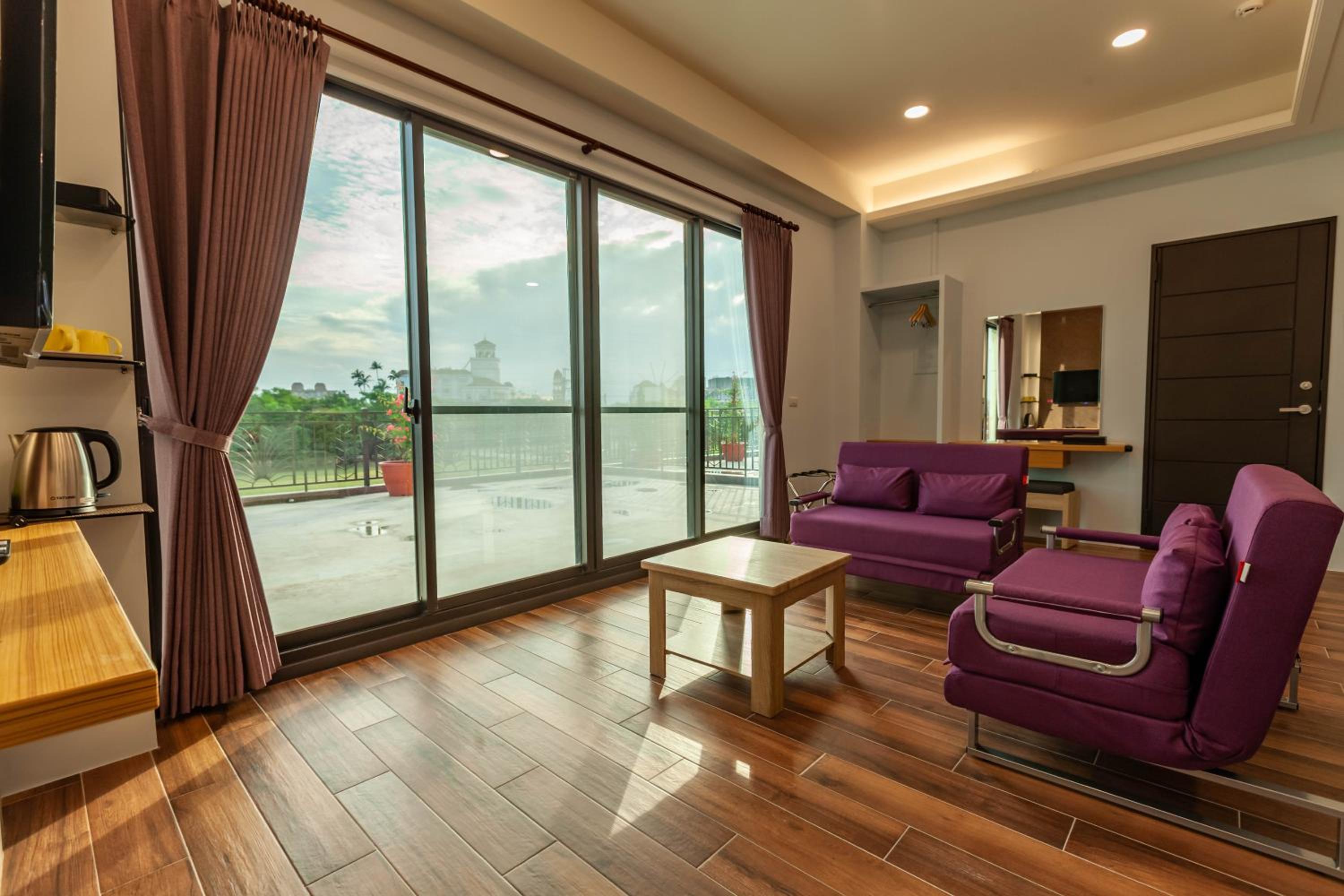 Family Room with Balcony - Photo 8