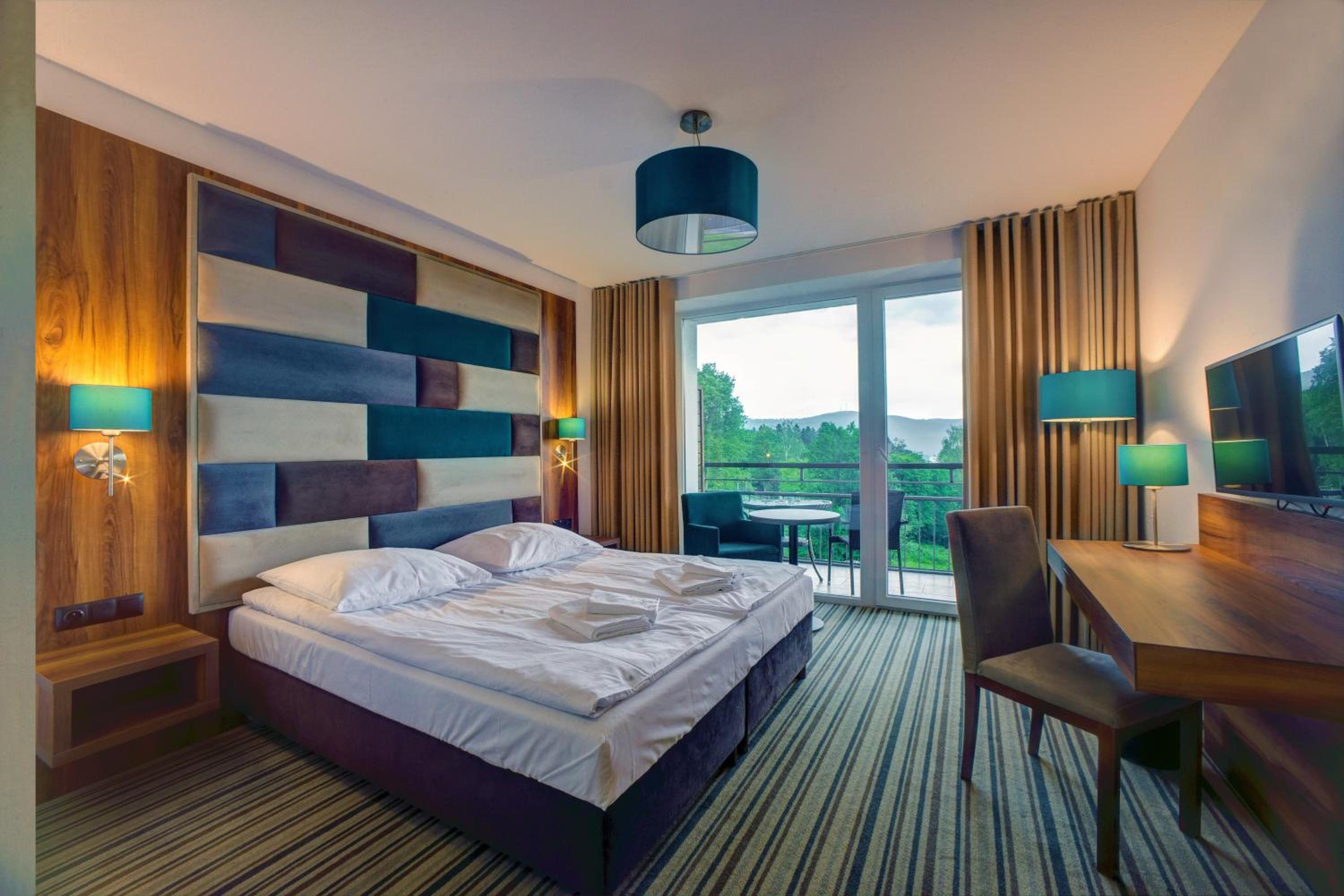 Deluxe Double Room with Balcony - Photo 1
