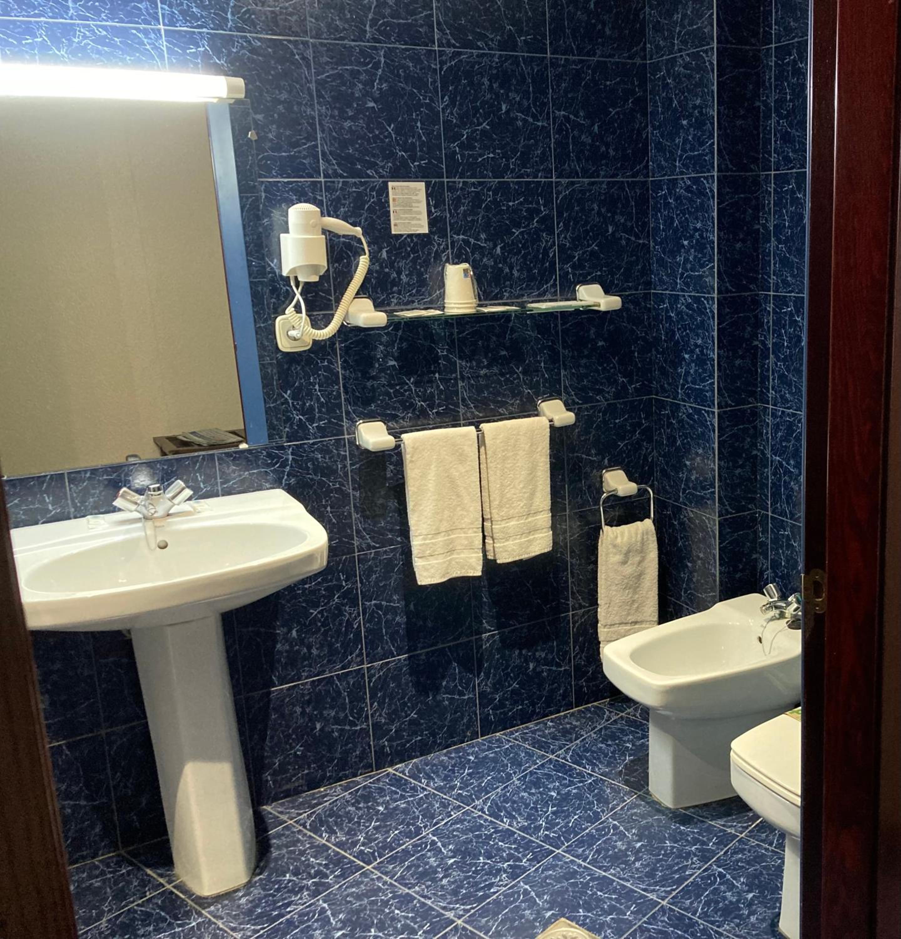 Quadruple Room (2 Adults + 2 Children) photo 2