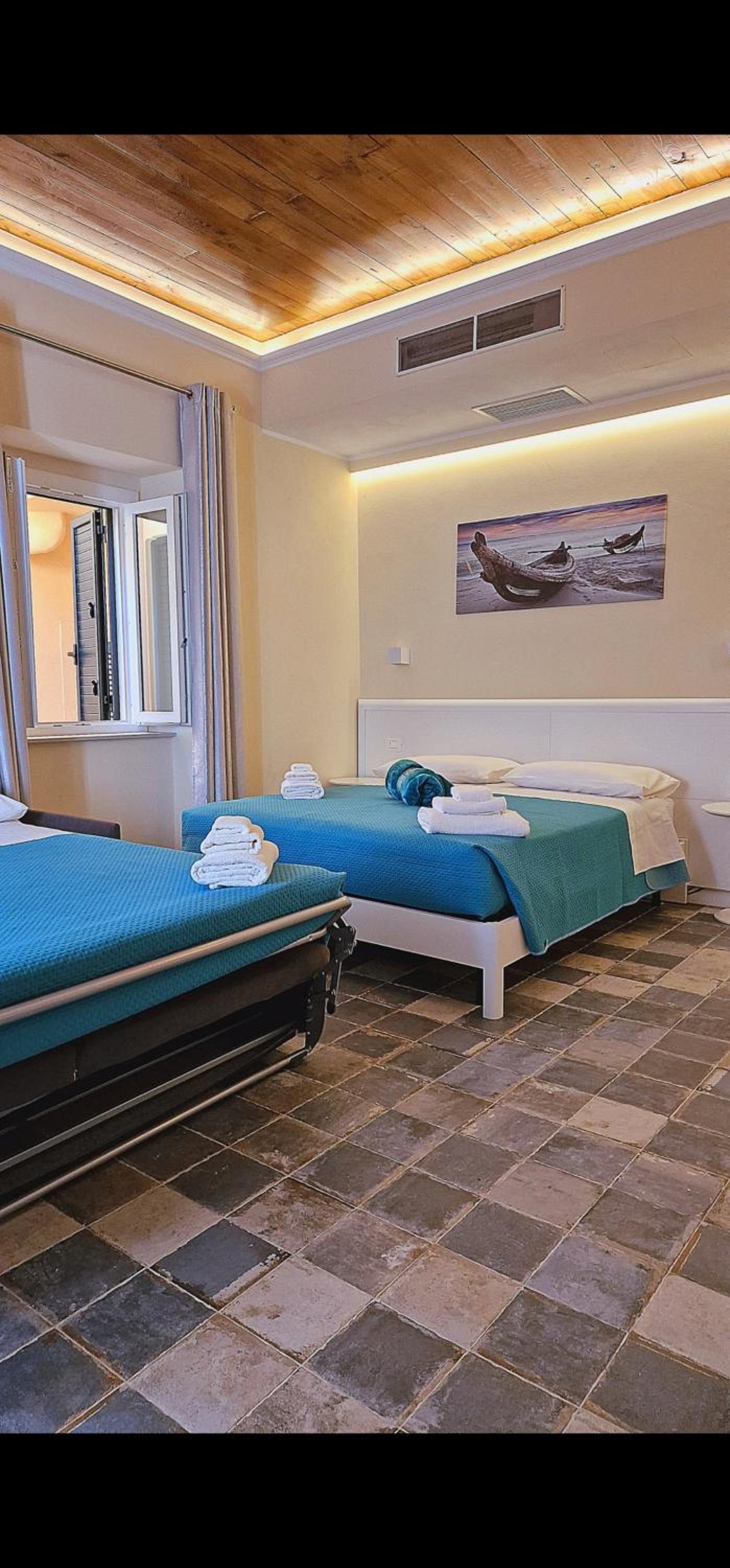 Quadruple Room with Balcony