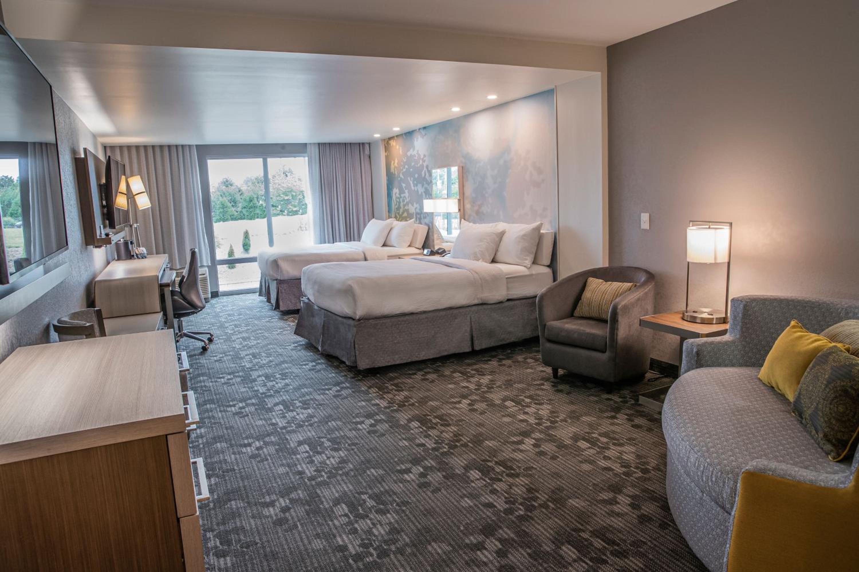 Queen Room with Two Queen Beds and Sofa Bed - Hearing Accessible - Photo 1