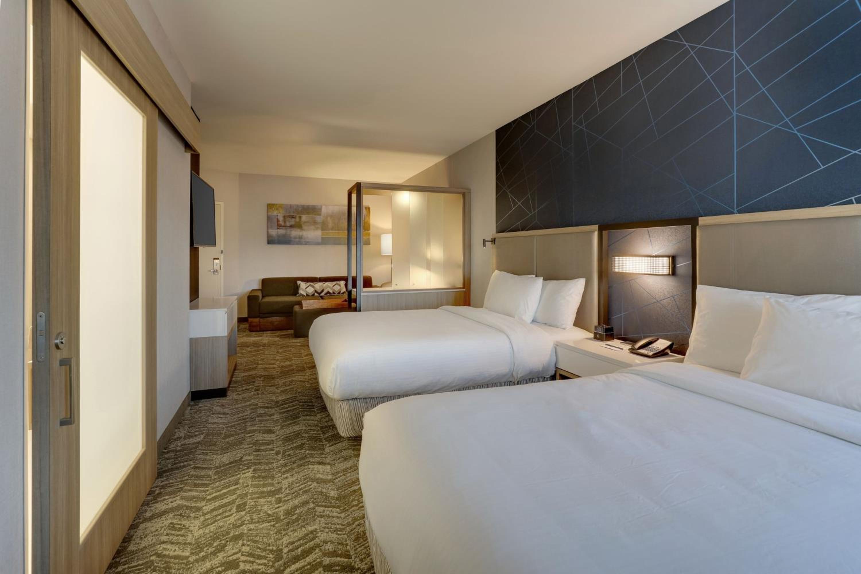 Queen Room with Two Queen Beds and Trundle Sofa - Photo 3