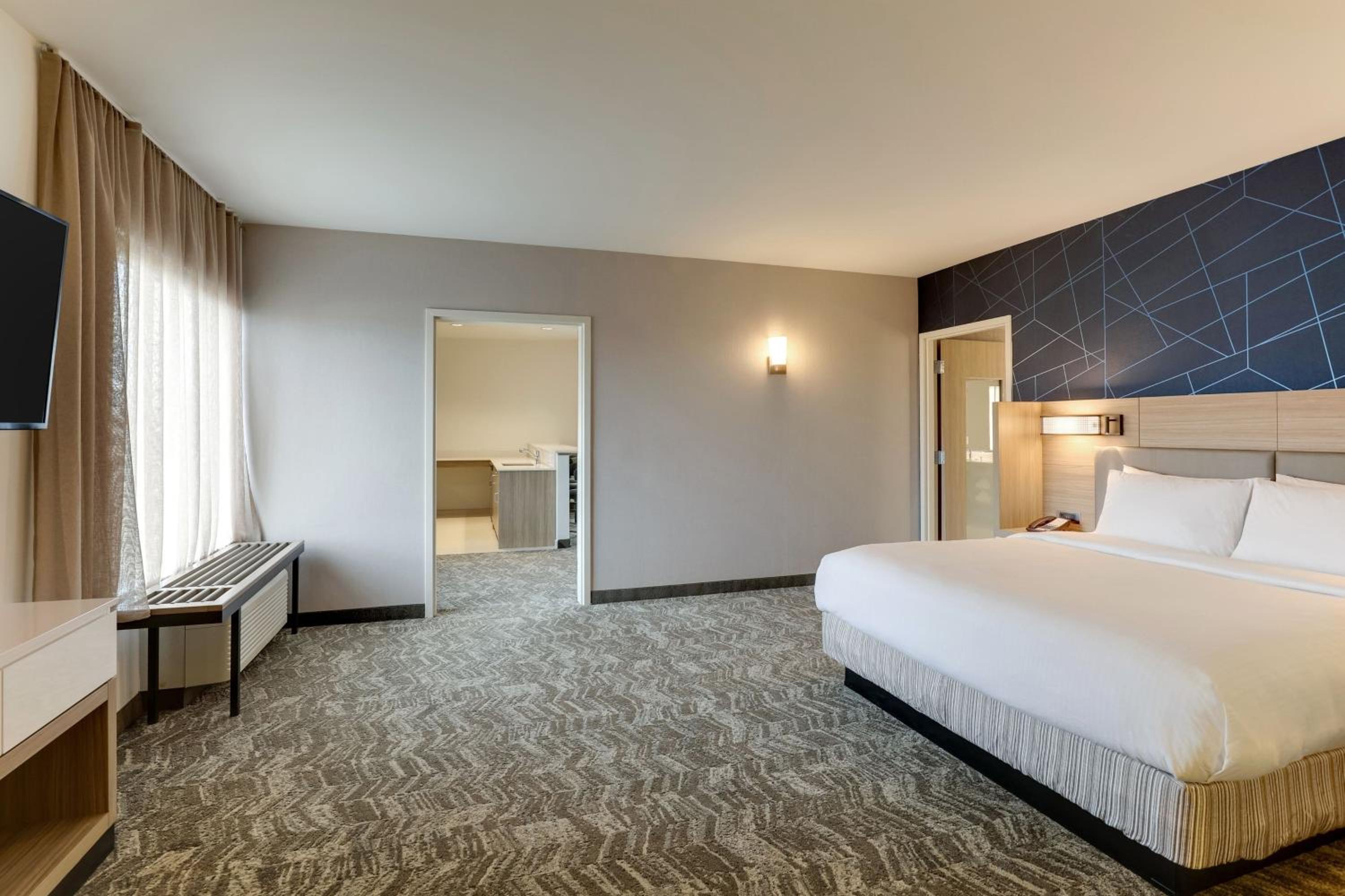 King Suite with Roll-In Shower and Trundle Sofa - Mobility Access/Hearing Accessible - Photo 4