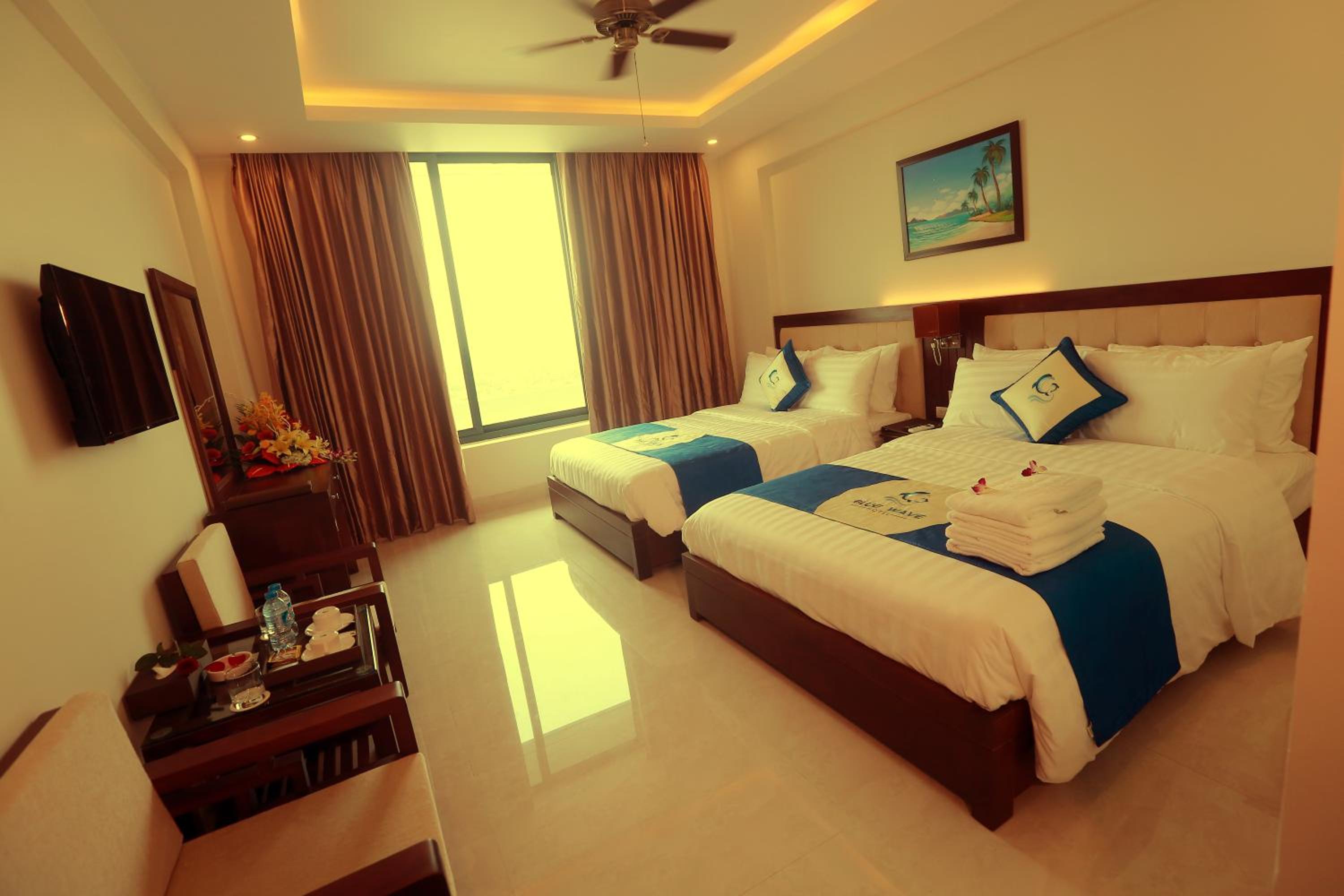 Deluxe Queen Room with Two Queen Beds photo 2