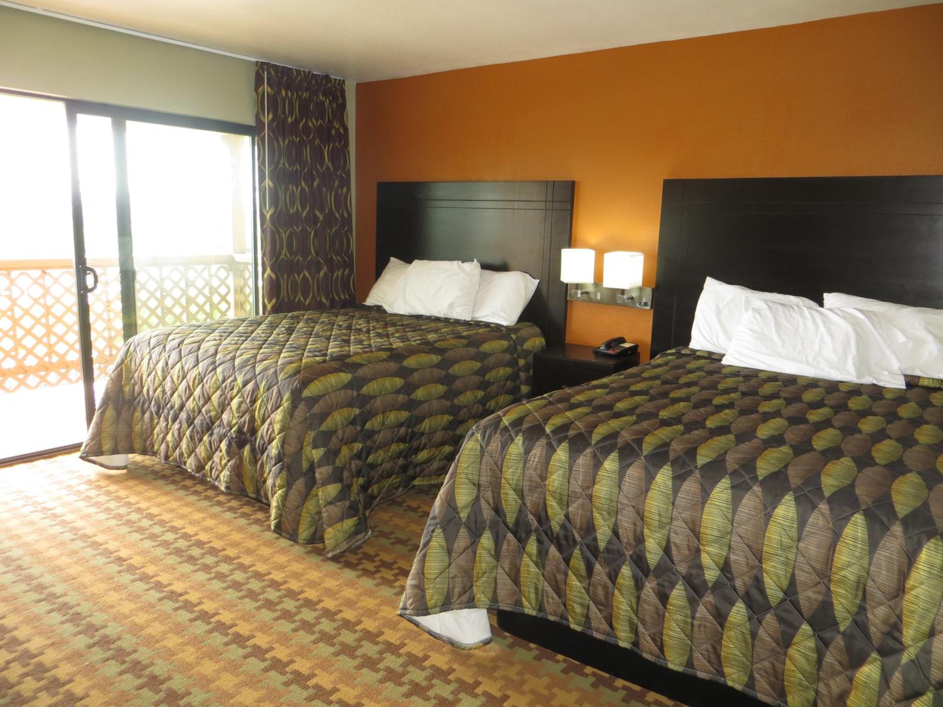 Standard Queen Room with Two Queen Beds - Photo 1
