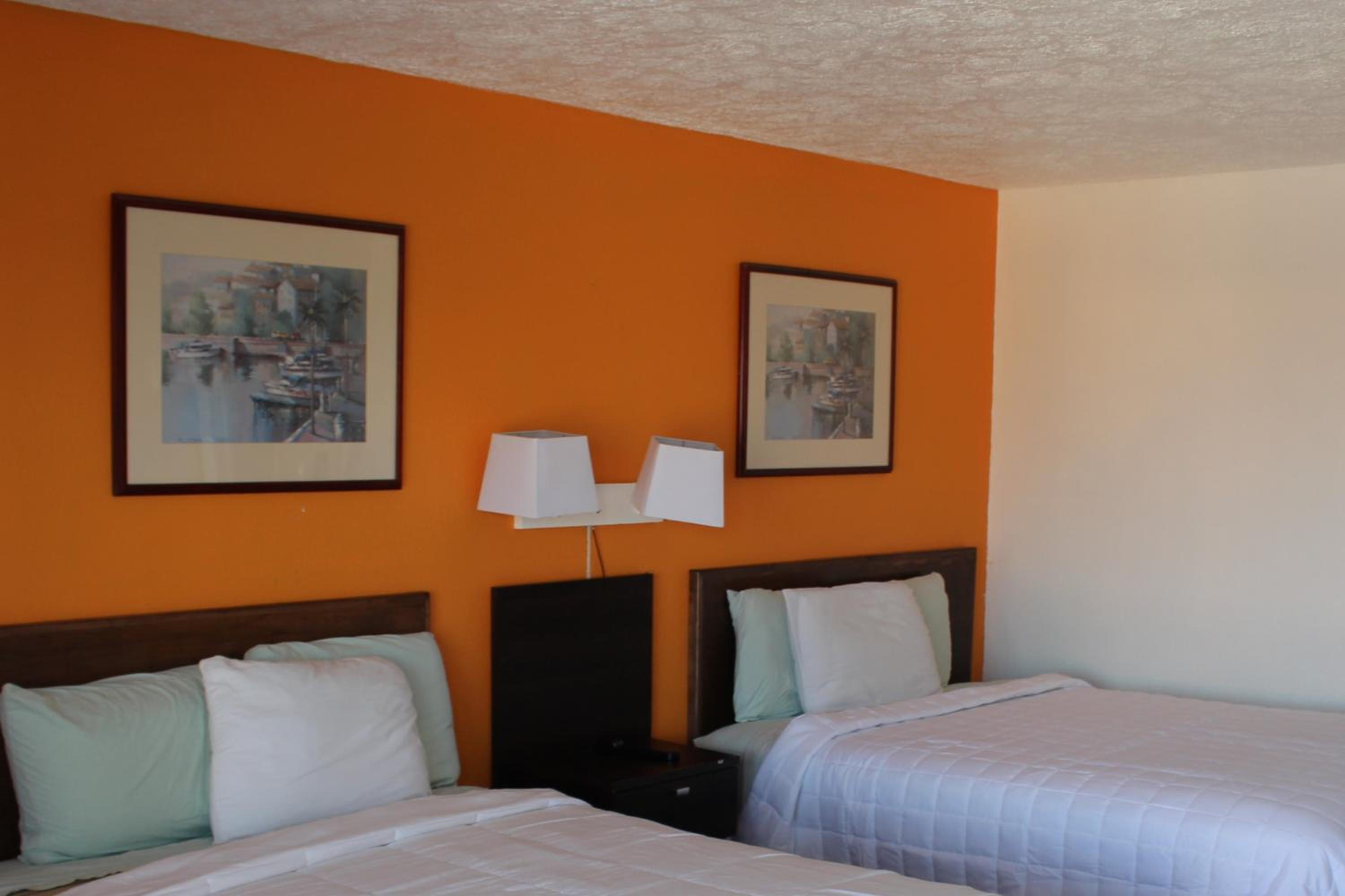 Queen Room with Two Queen Beds - Photo 1
