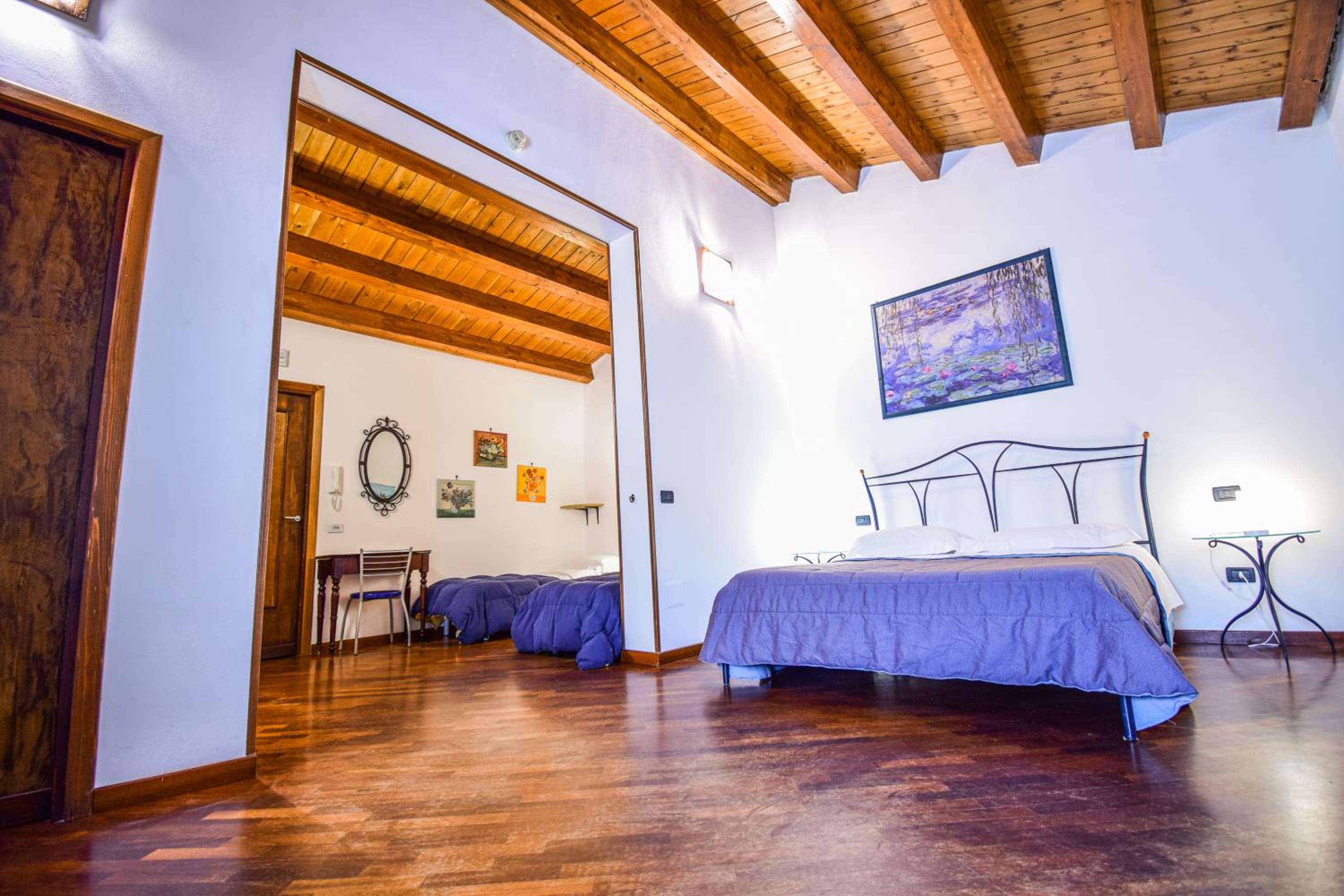 Habitación Cuádruple con Baño Privado