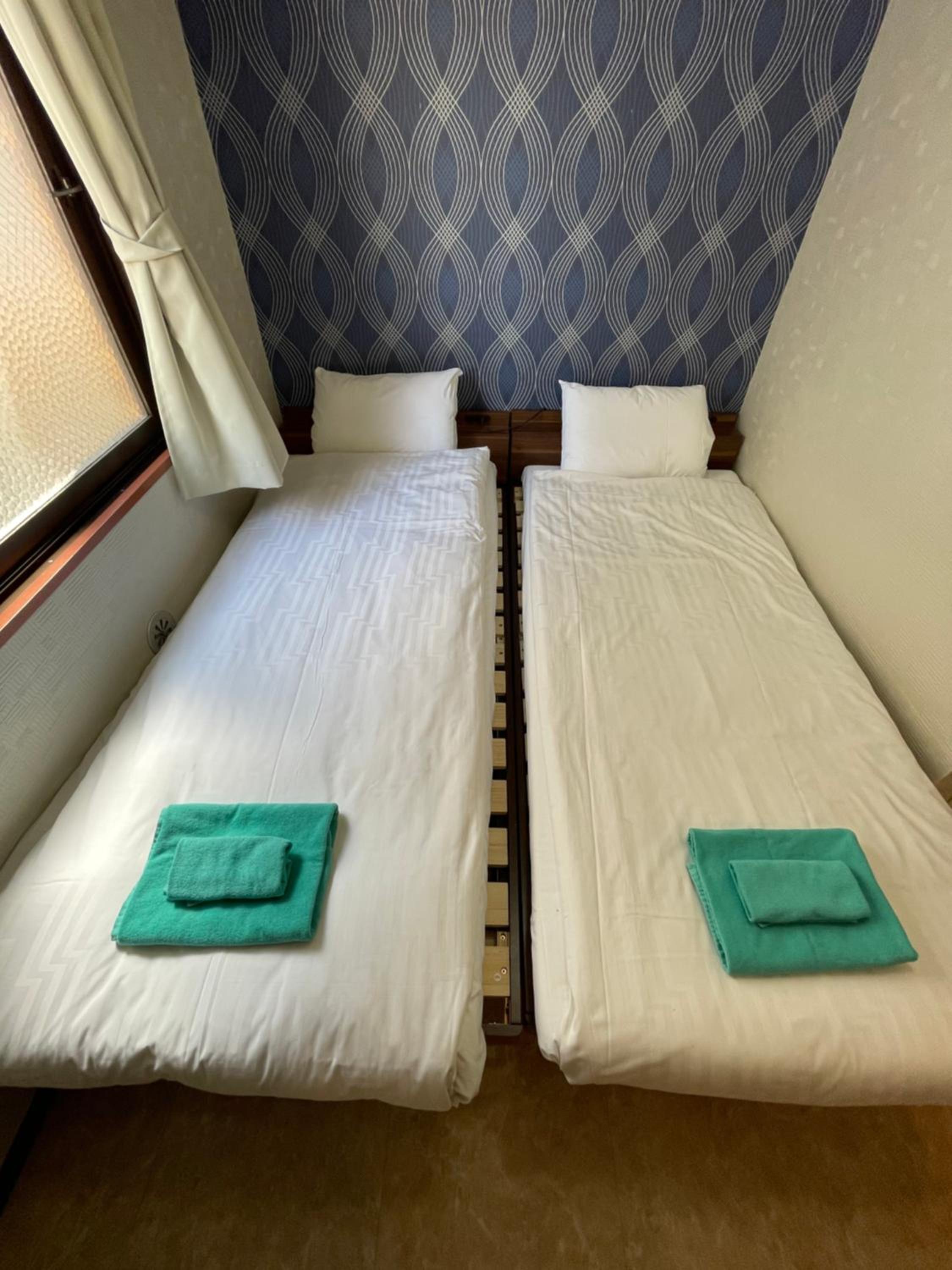 Twin Room - Photo 5
