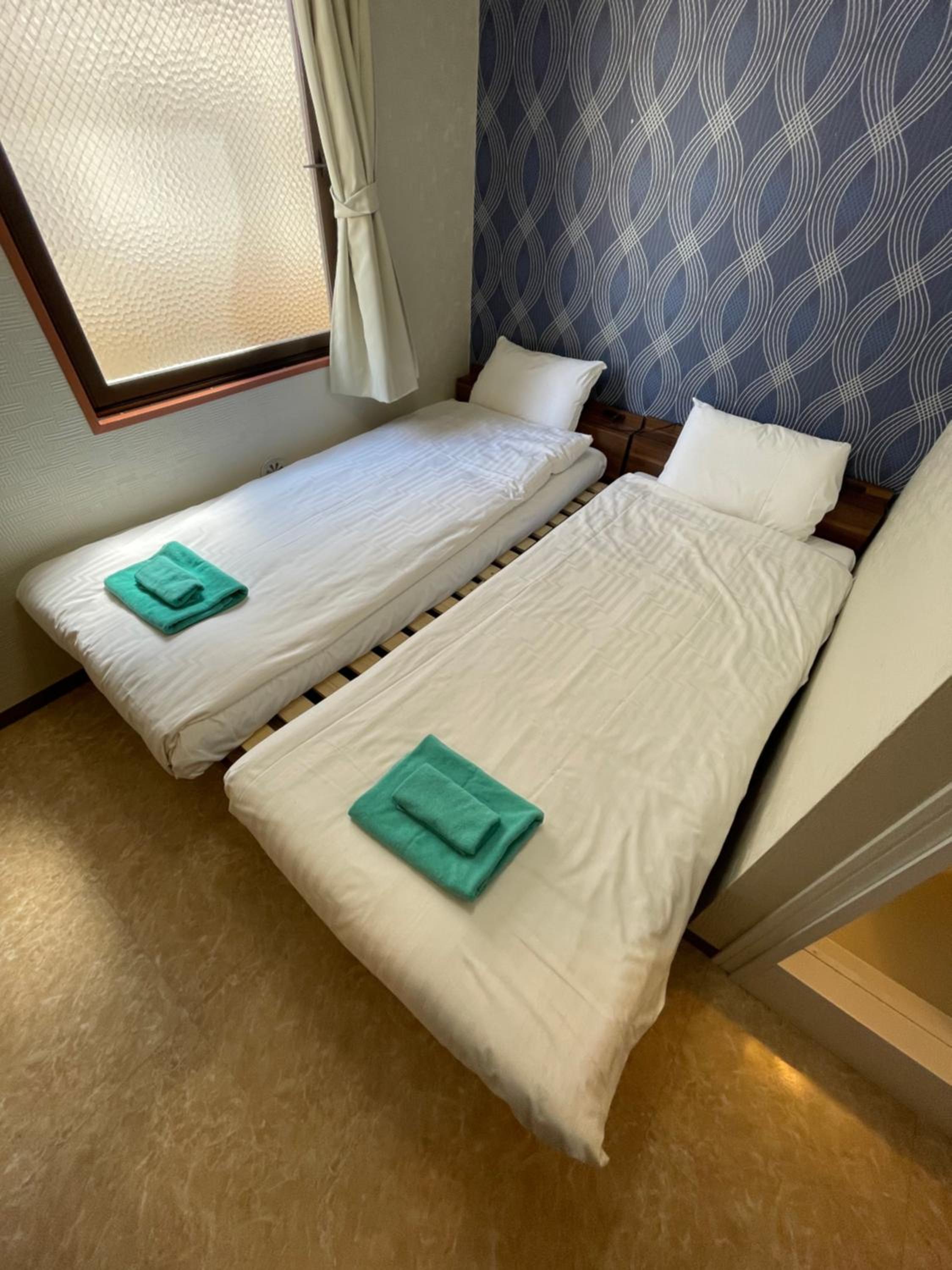 Twin Room - Photo 1
