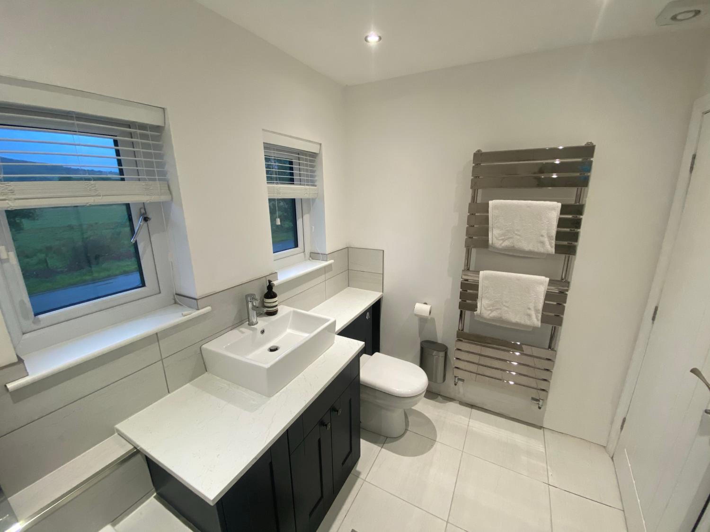 Three-Bedroom House - Photo 18