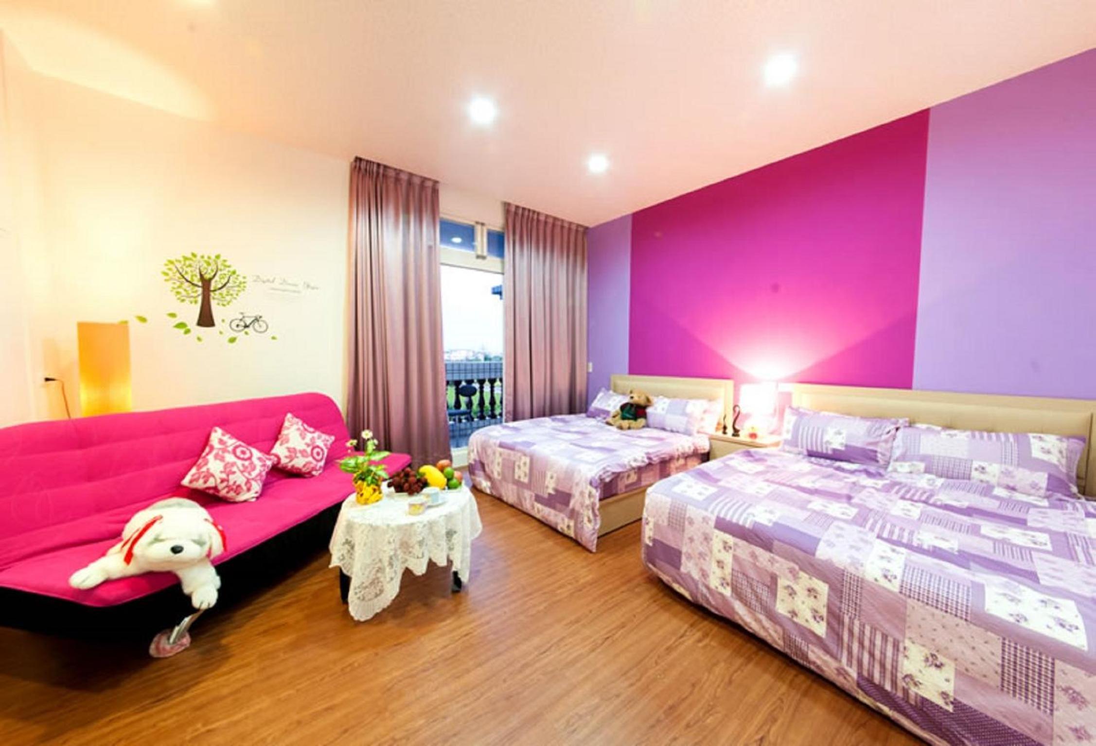 Pink Quadruple Room with Balcony