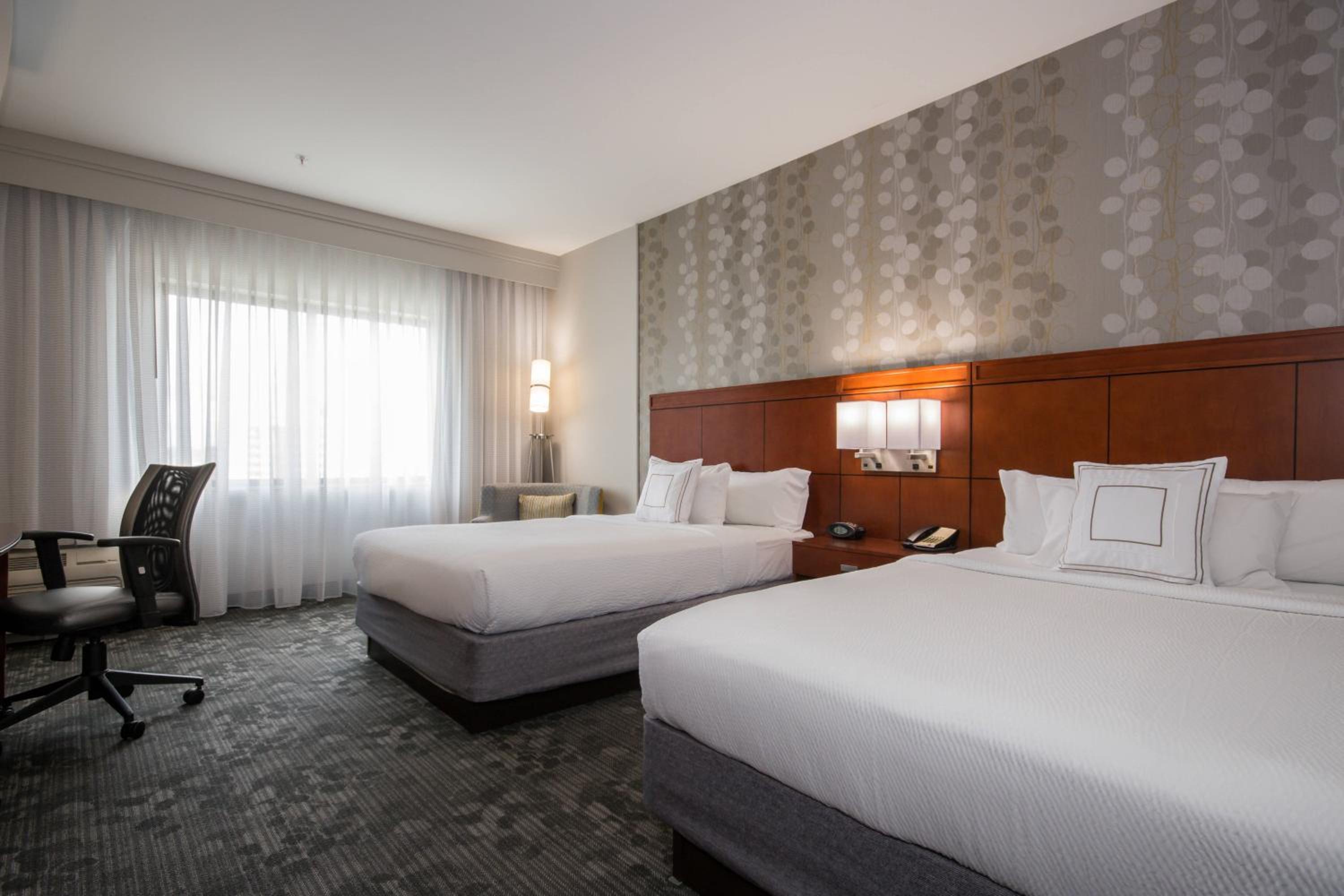 Queen Room with Two Queen Beds - Photo 1