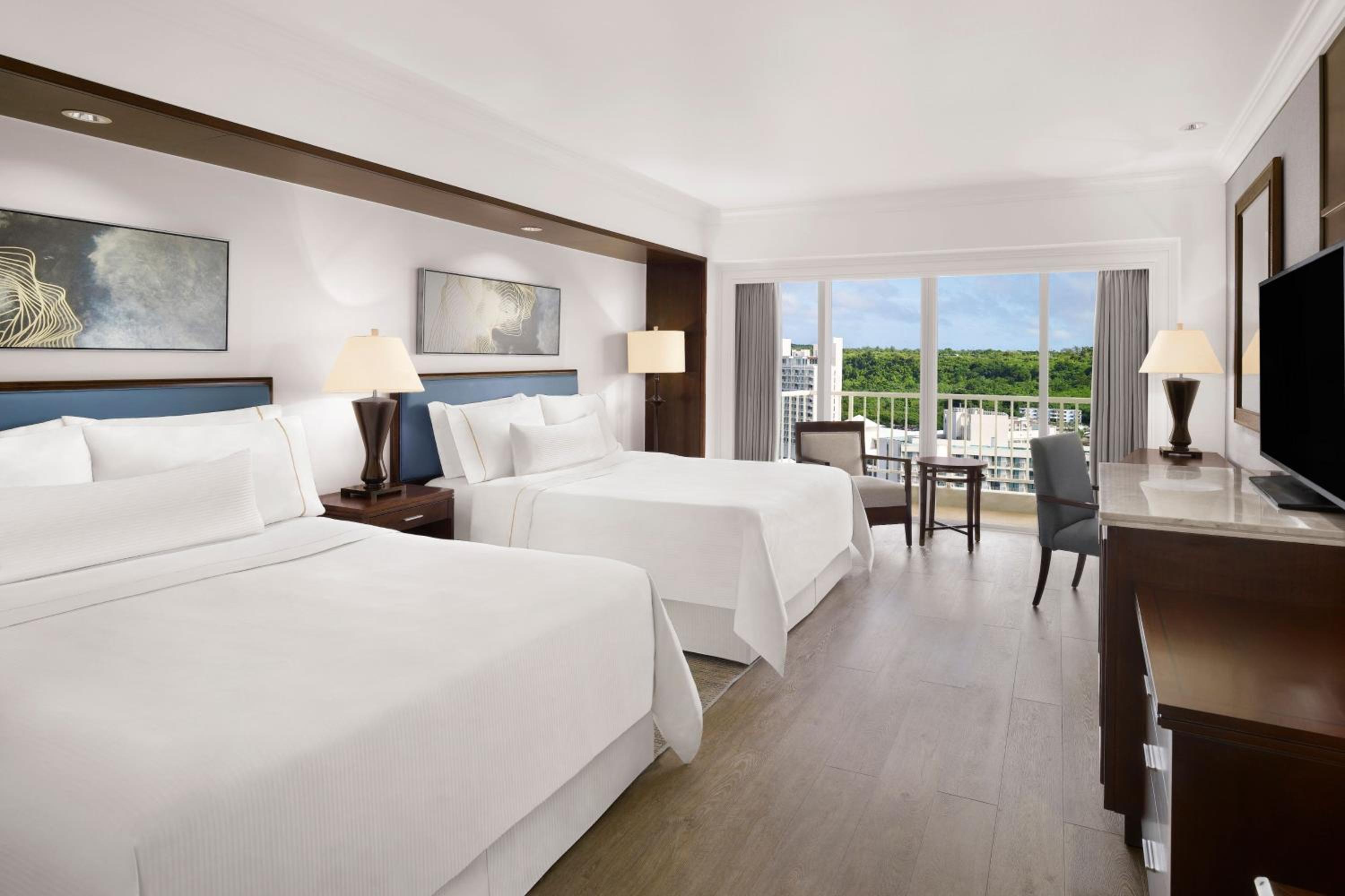 Deluxe Room with Partial Ocean View and 2 Queen Beds - Photo 2