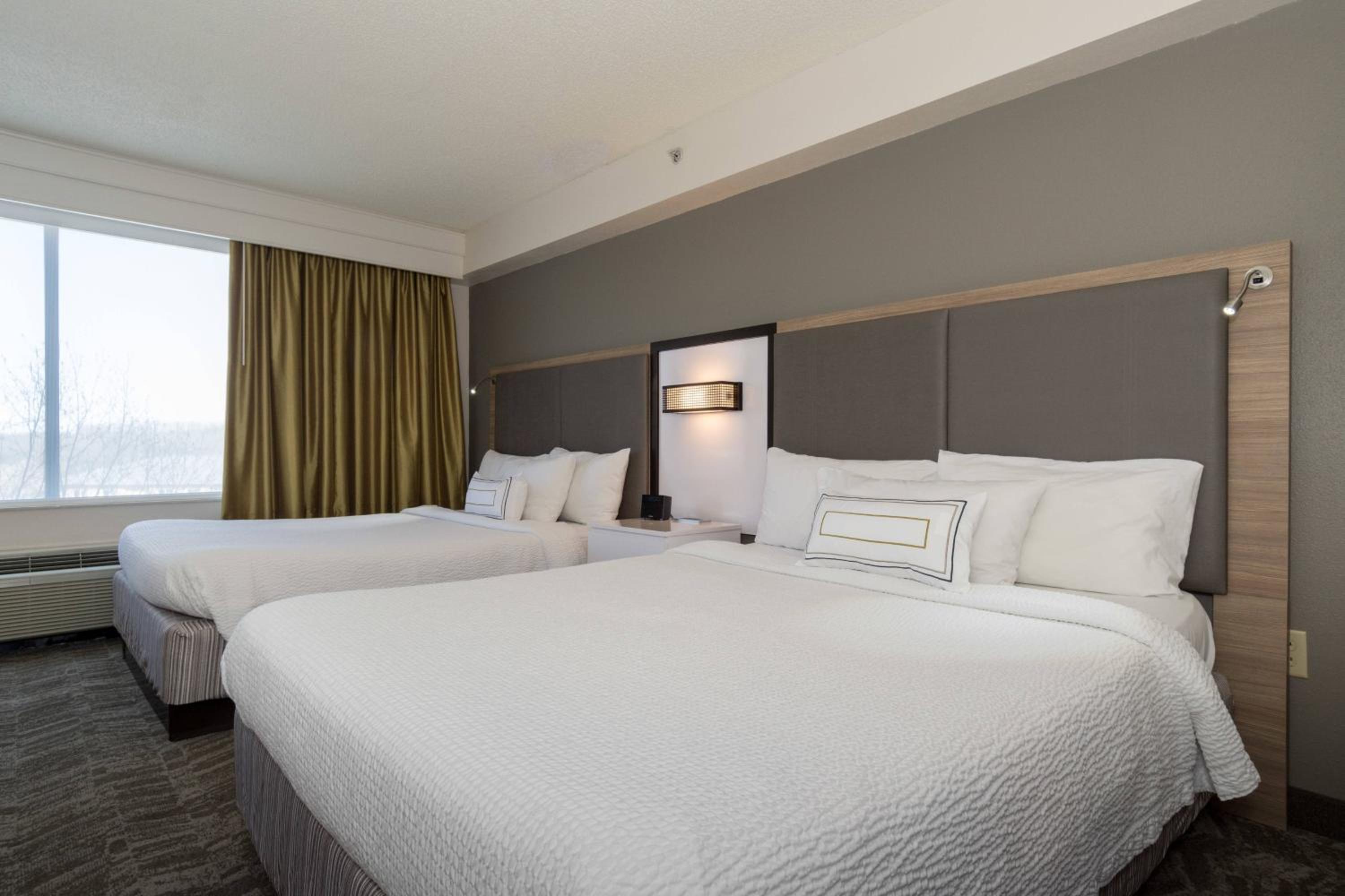Queen Suite with Two Queen Beds and Trundle Sofa - Photo 1