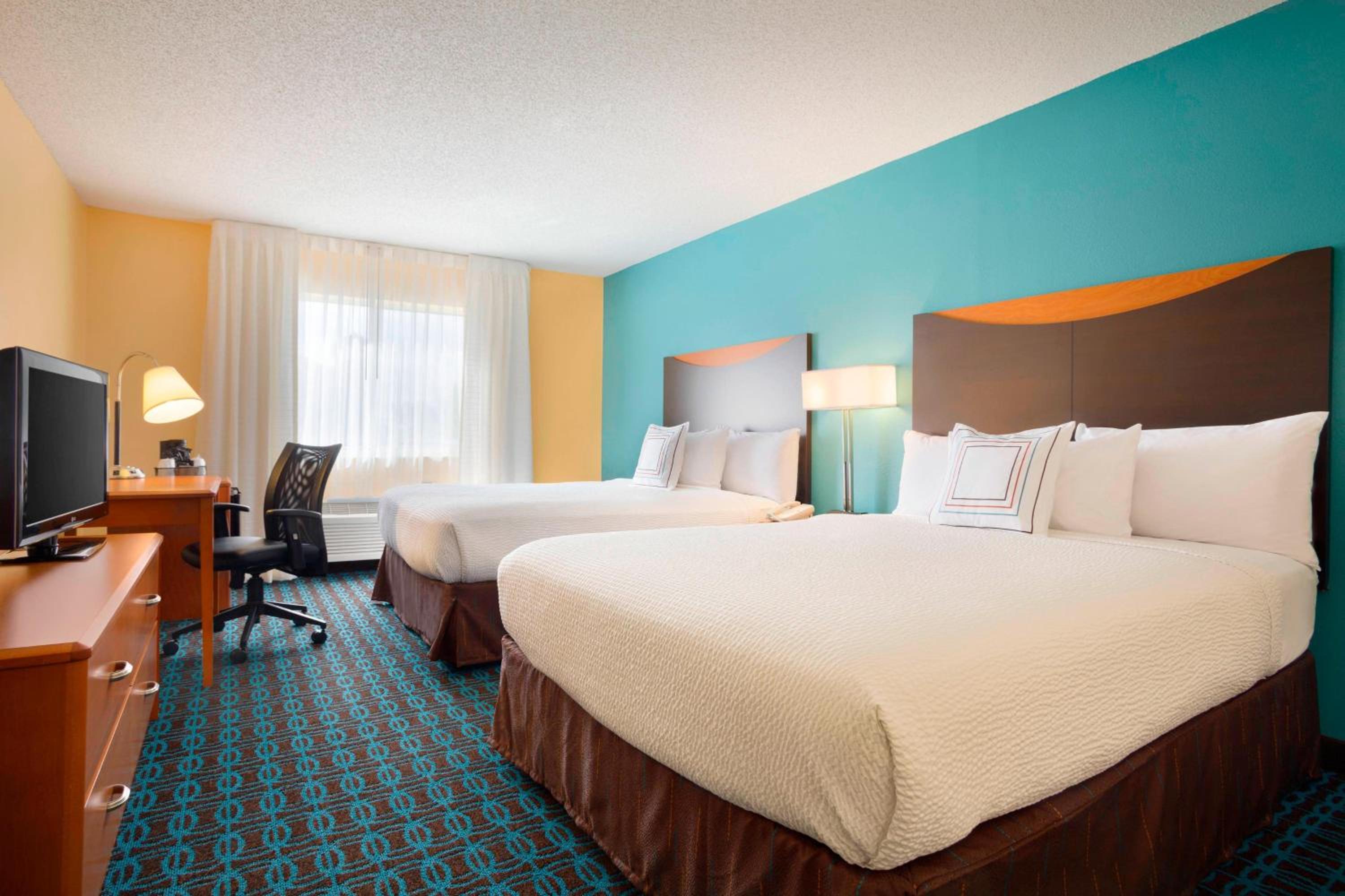 Queen Room with Two Queen Beds - Photo 1