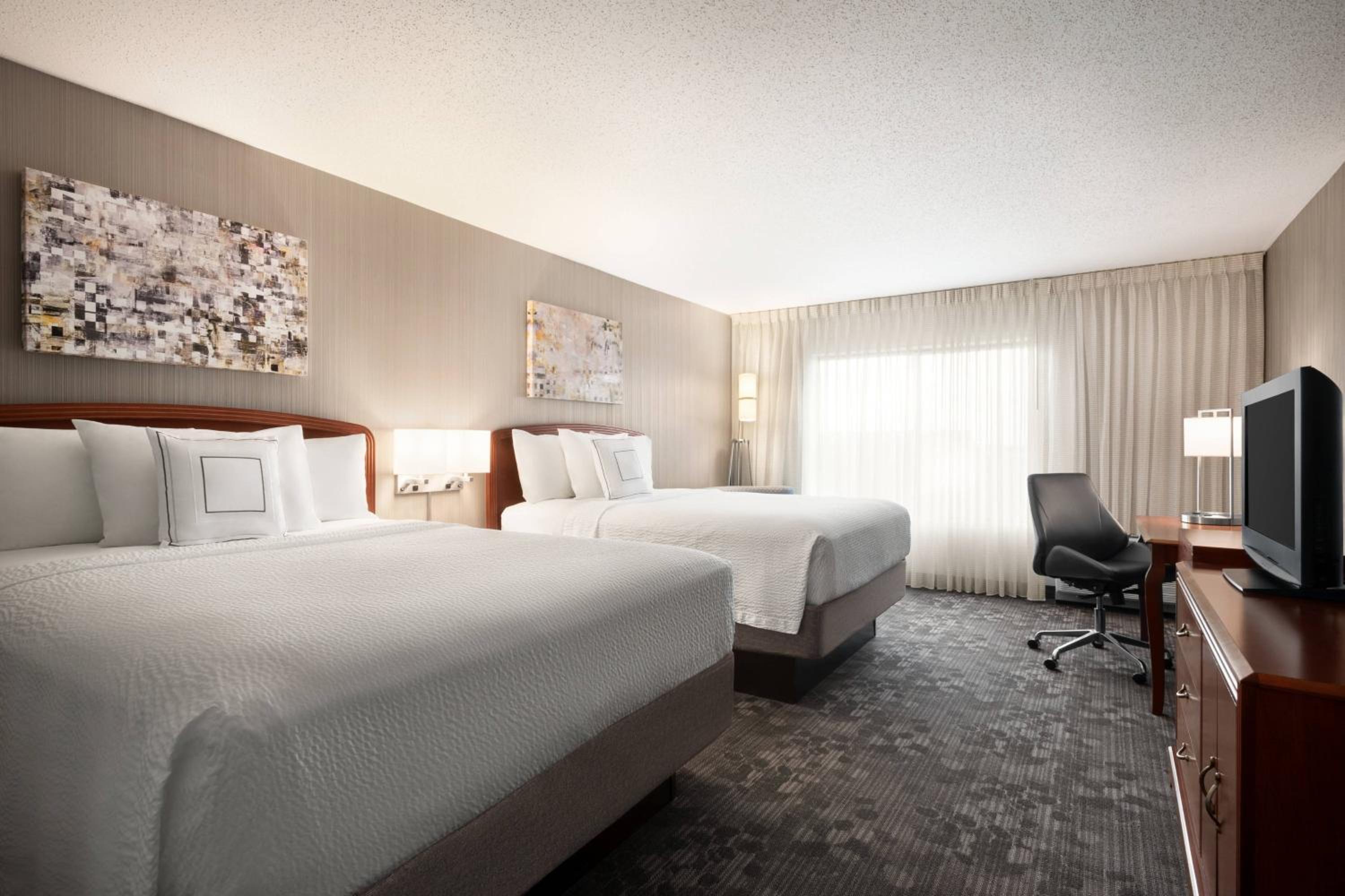 Queen Room with Two Queen Beds - Photo 1