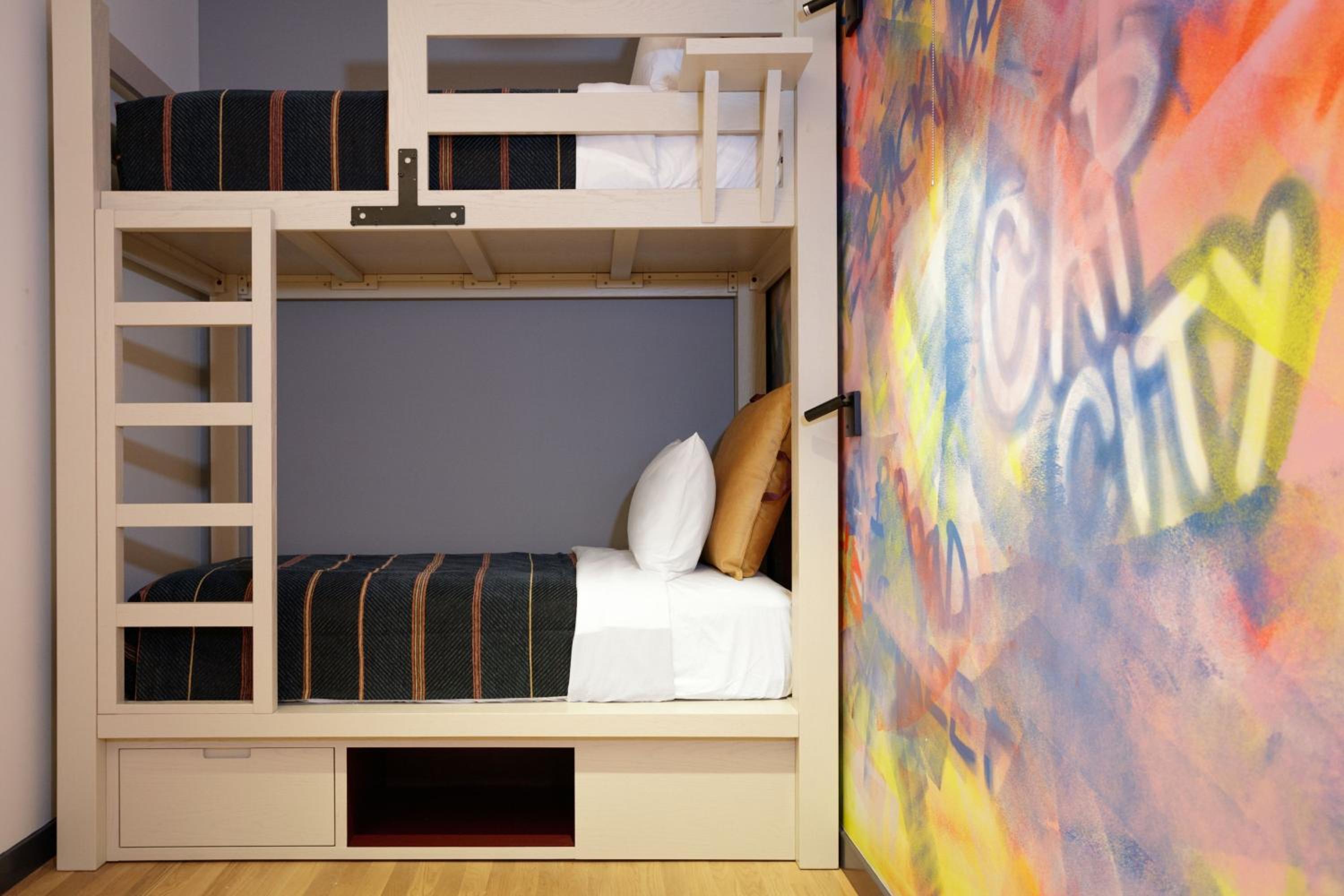 Queen Room with Two Twin Bunk Beds - Hearing Accessible - Photo 3