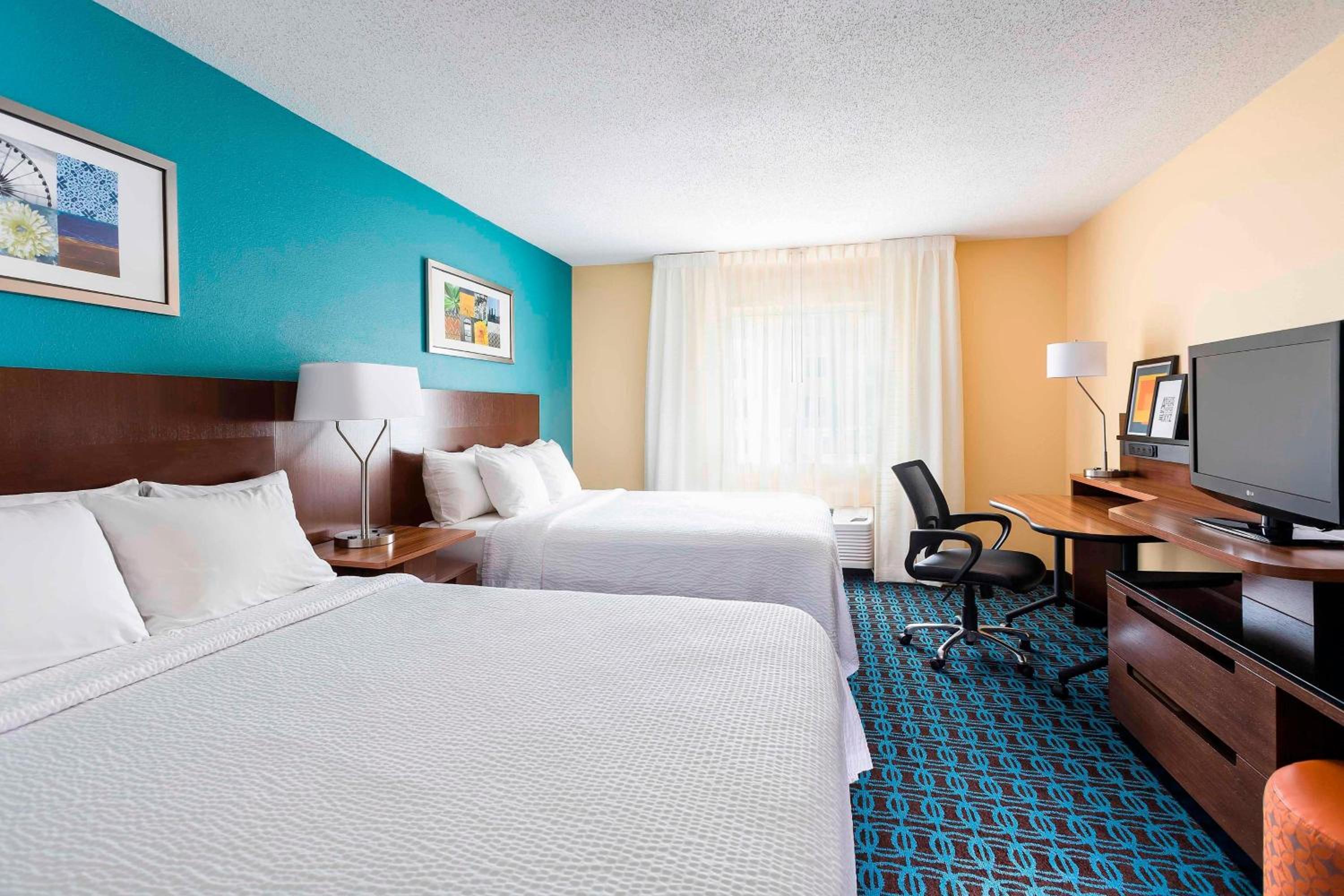 Queen Room with Two Queen Beds - Photo 1